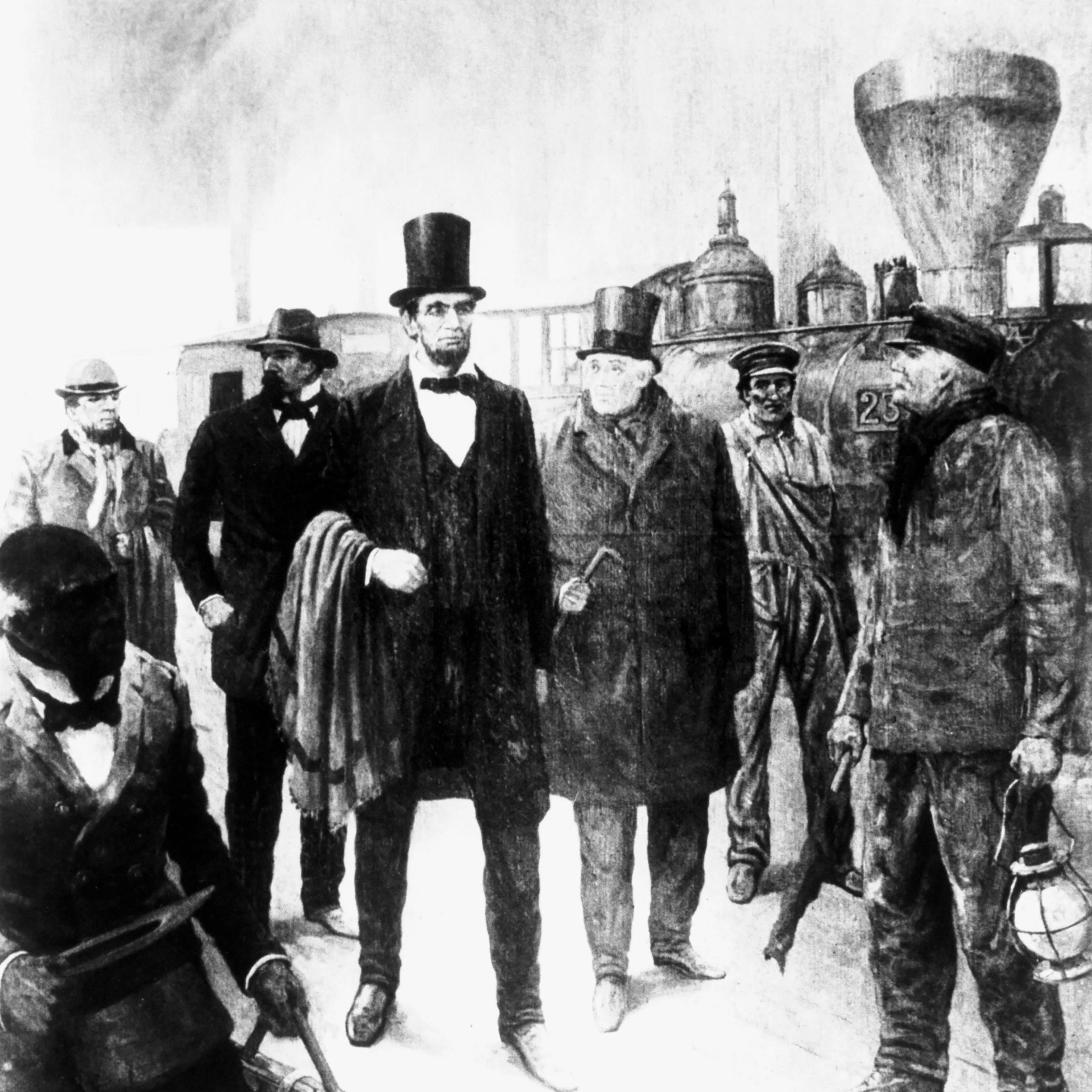 President Abraham Lincoln walks beside a locomotive at a railroad station.