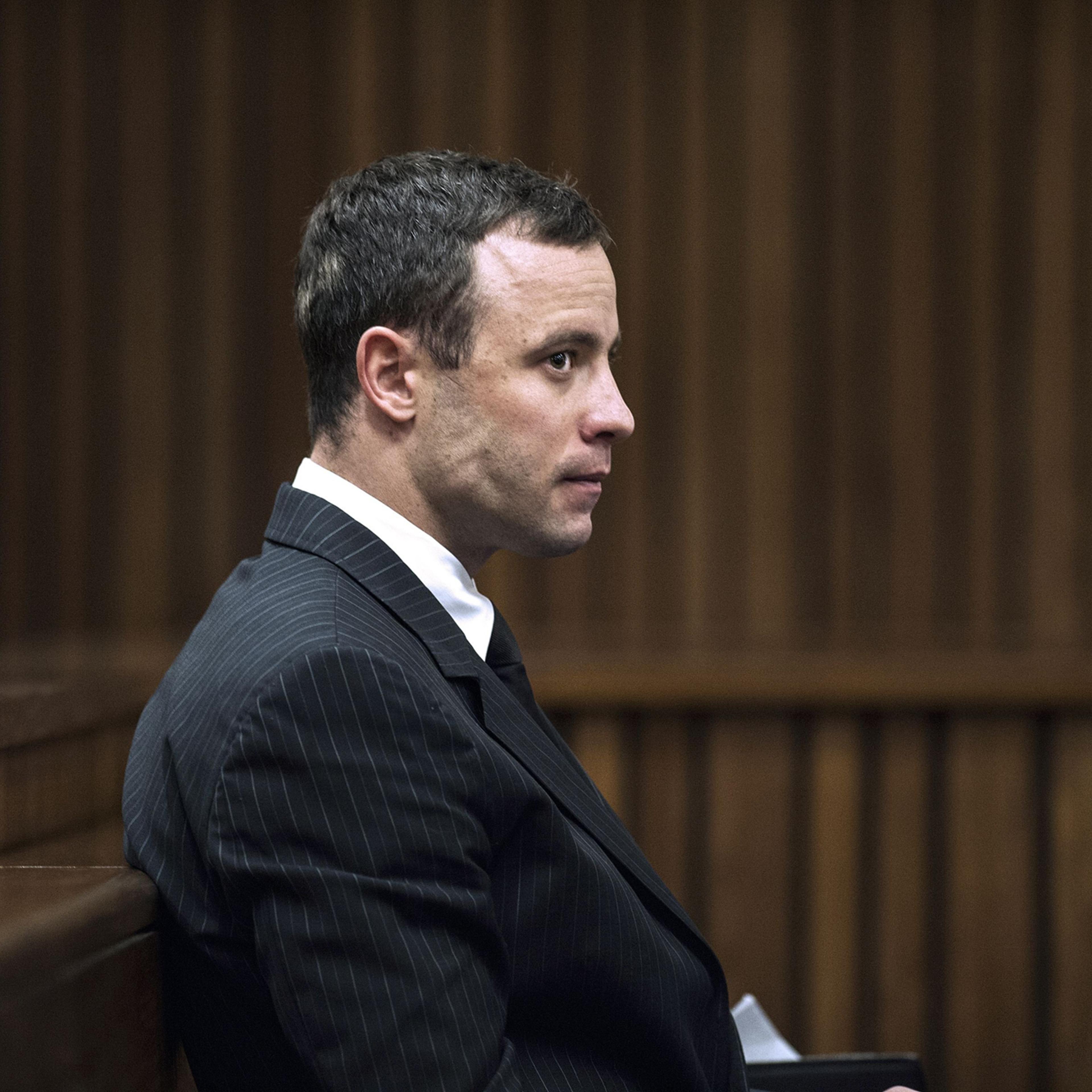 Paralympian Oscar Pistorius sits in the dock during his murder trial at the High Court in Pretoria, on July 2, 2014.