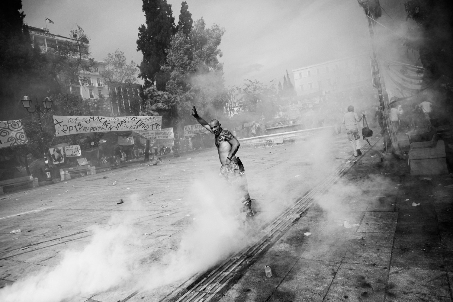 A man in Athens reacts after an attack by riot police on Syntagma Square, the site of mass protests in response to budget cuts, June 15, 2011. 