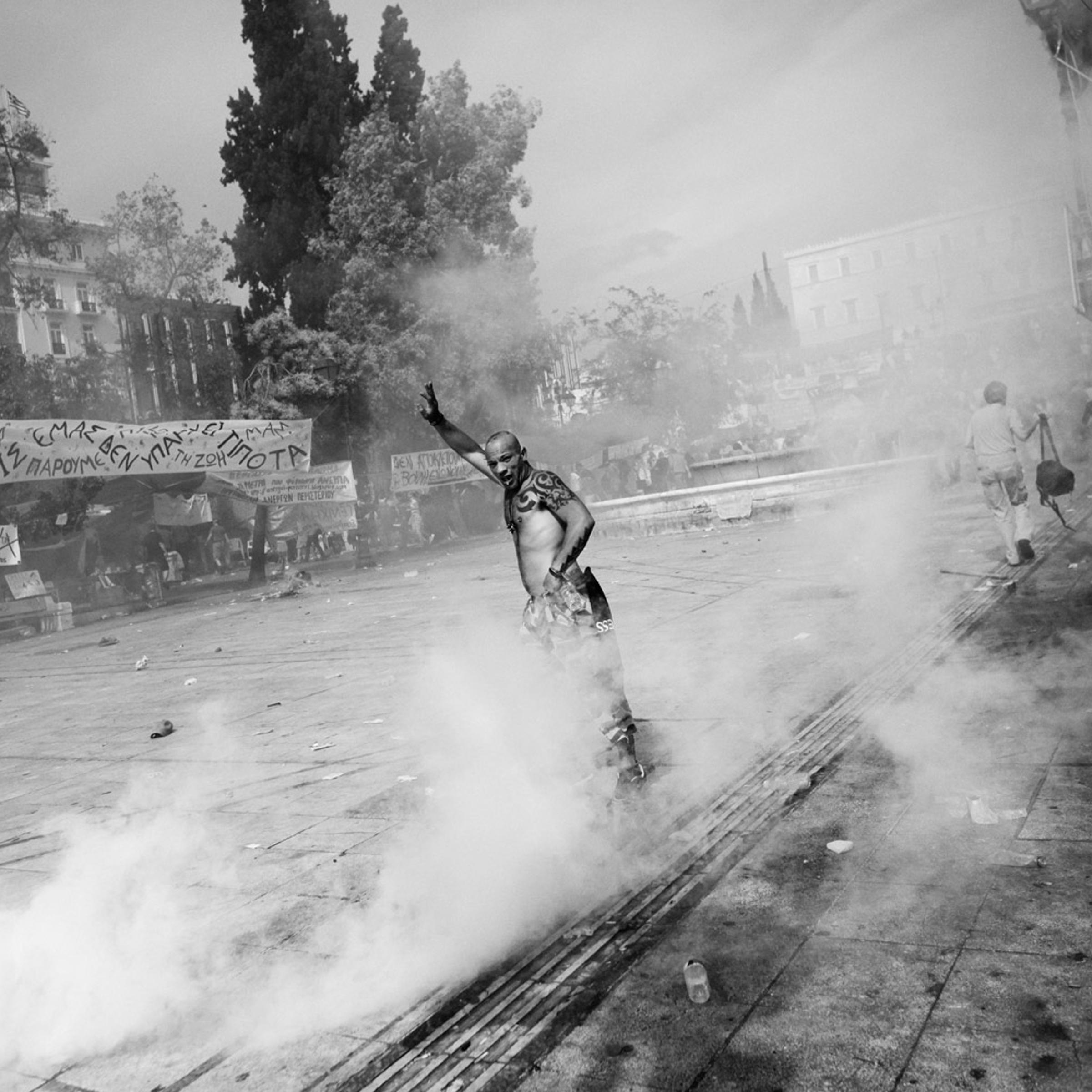 A man in Athens reacts after an attack by riot police on Syntagma Square, the site of mass protests in response to budget cuts, June 15, 2011.
