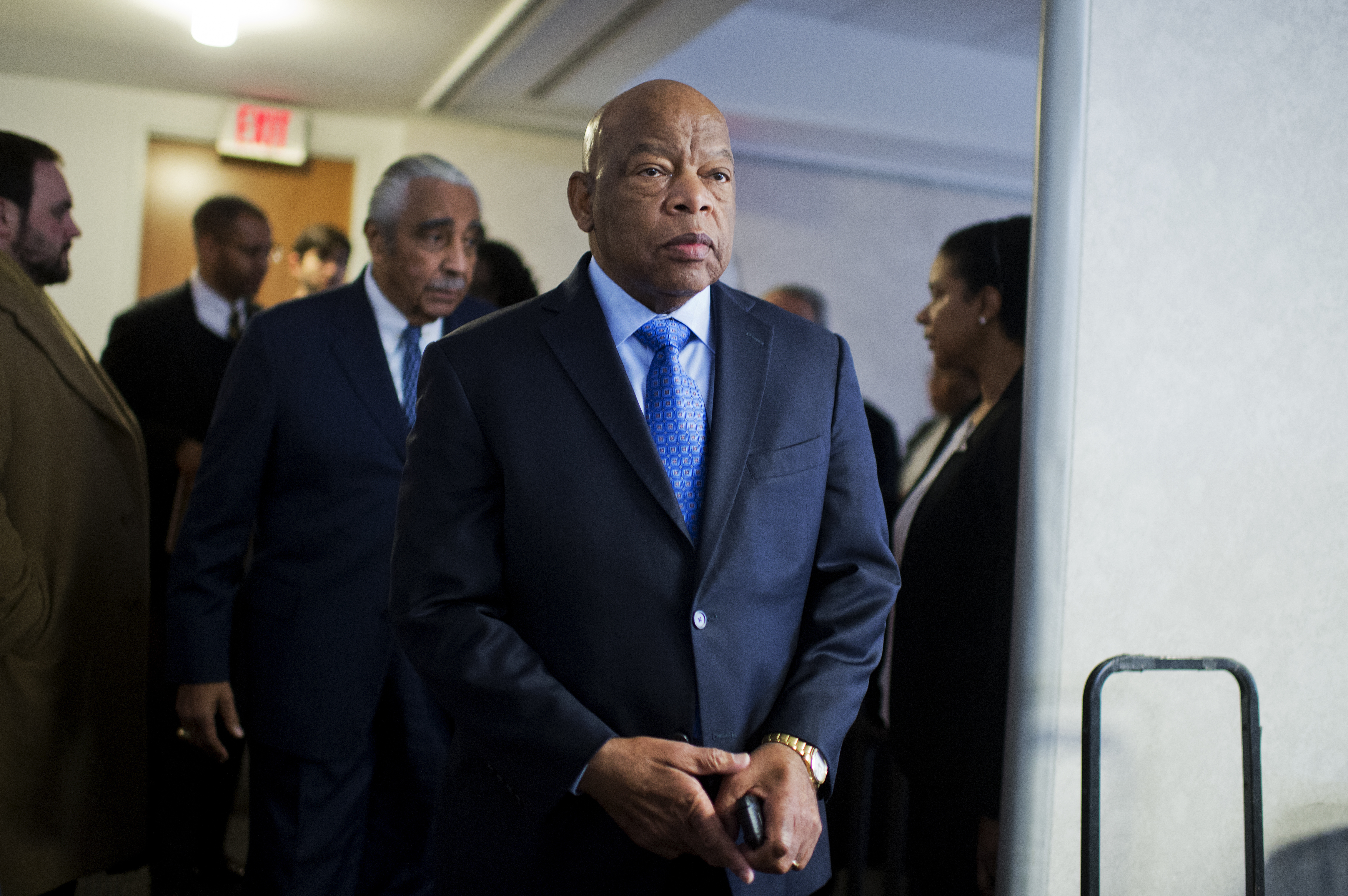 UNITED STATES - FEBRUARY 11: Rep. John Lewis, D-Ga., and Rep. Charlie Rangel, D-N.Y., behind him, arrive for a news conference at the DNC where members of the Congressional Black Caucus PAC endorsed Hillary Clinton for president, February 11, 2016. (Phot