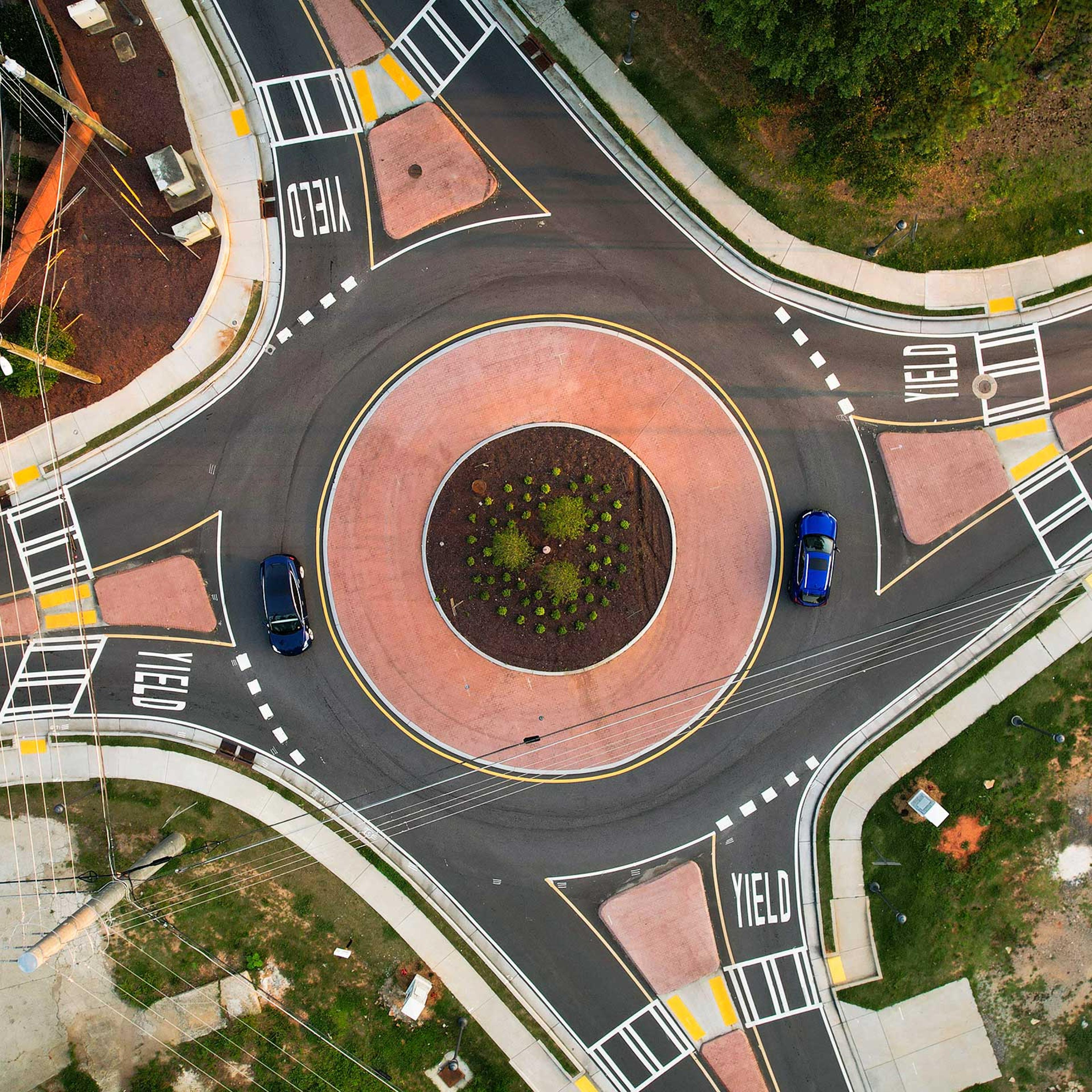 Cars travel through a roundabout in Georgia