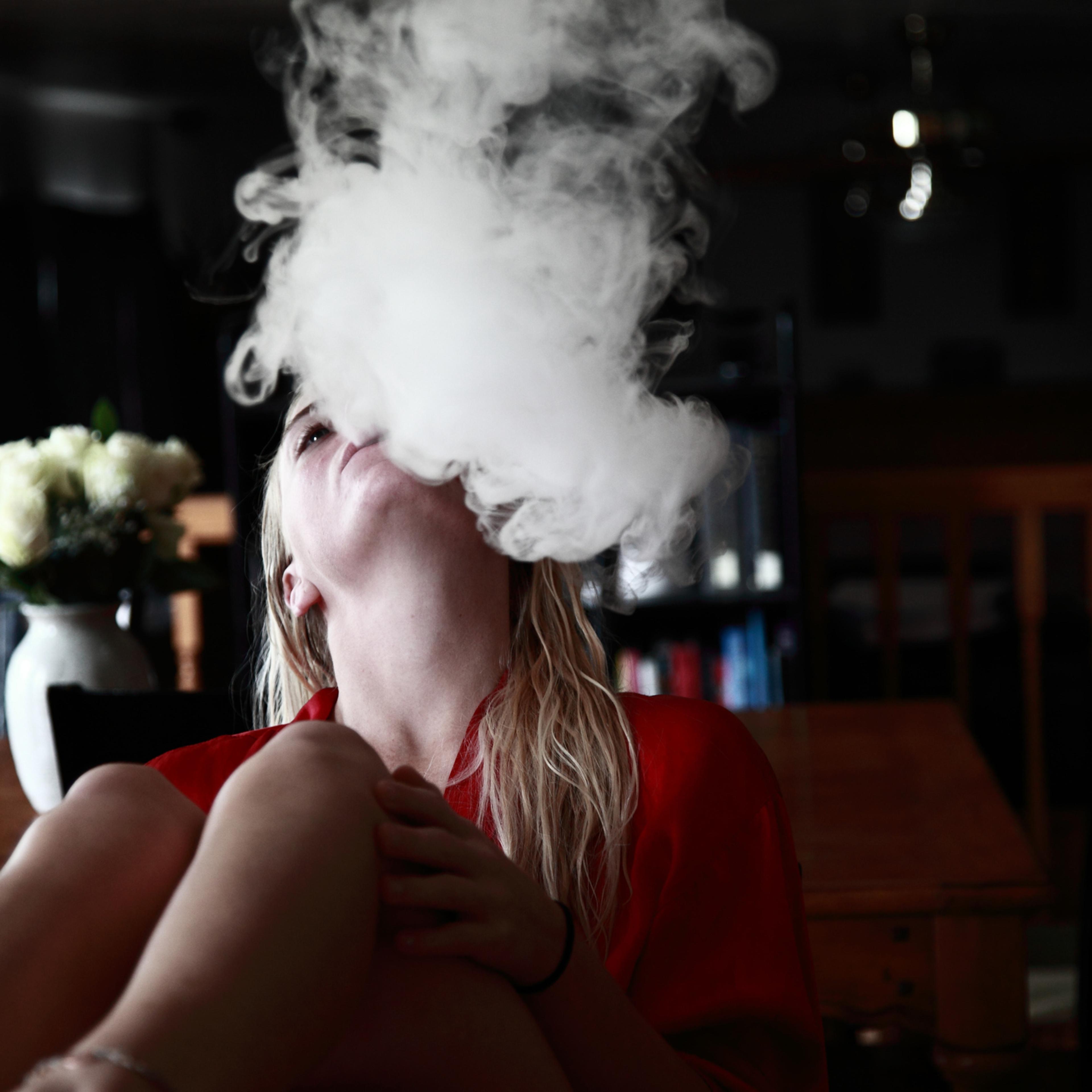 Vaping e-cigarettes