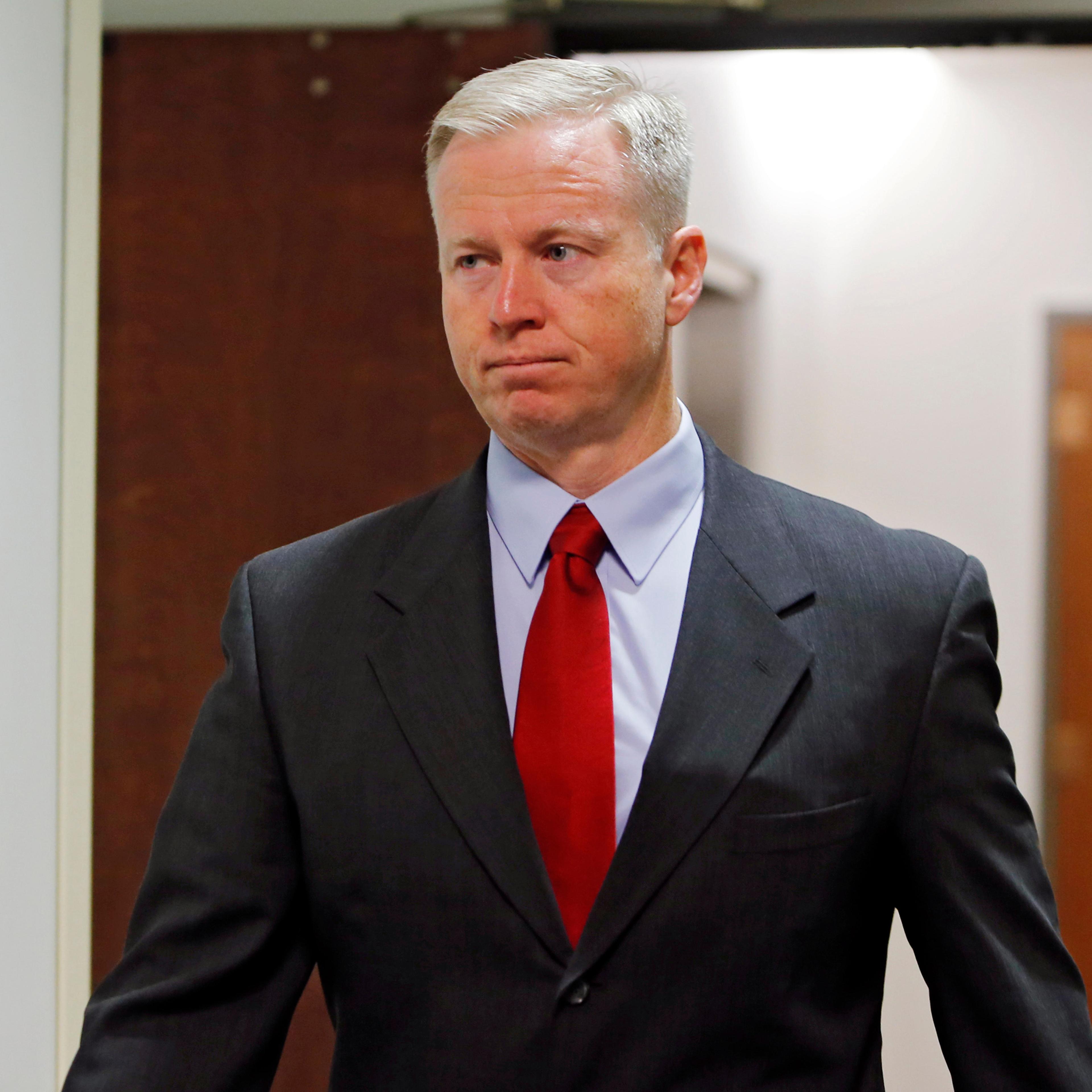 18th Judicial District Attorney George Brauchler arrives for a hearing for Aurora theater shooting suspect James Holmes at district court in Centennial, Colo. on Sept. 30, 2013.