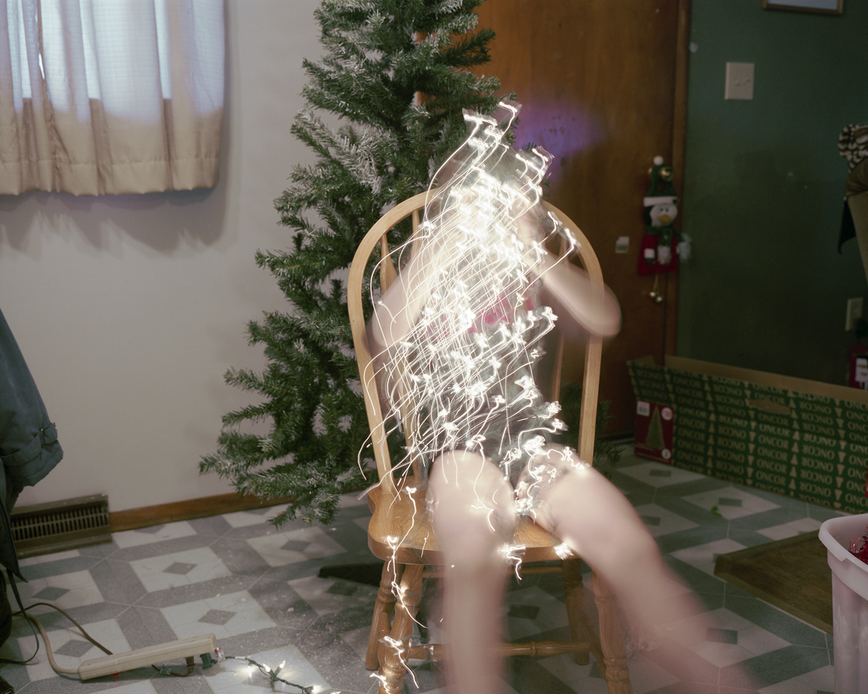 Mom thinks the Christmas lights look like something else.  2008