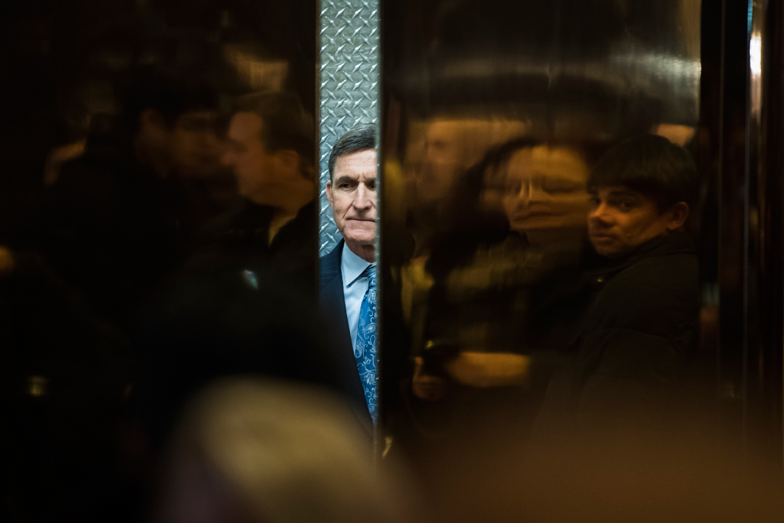 Retired Lt. Gen. Michael Flynn, Donald Trump's pick for National Security Adviser, boards an elevator at Trump Tower in New York, on Jan. 4, 2017.