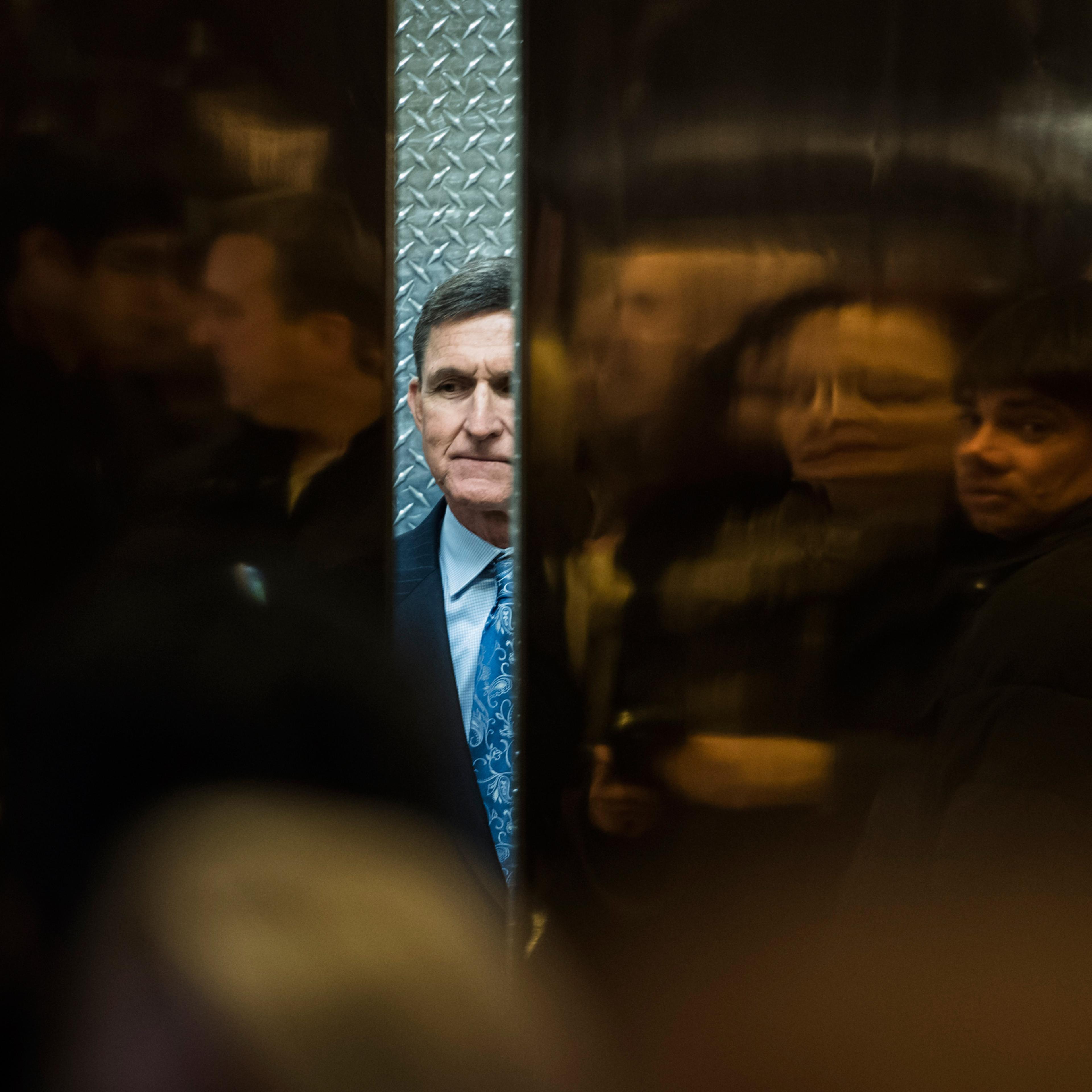 Retired Lt. Gen. Michael Flynn, Donald Trump's pick for National Security Adviser, boards an elevator at Trump Tower in New York, on Jan. 4, 2017.