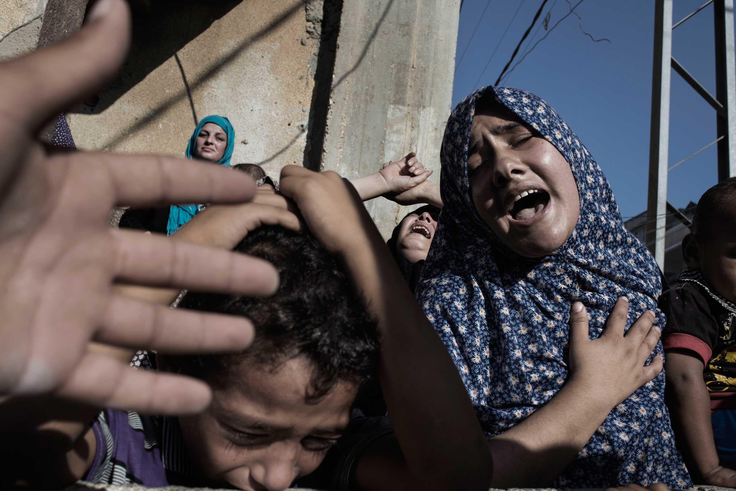 Innocents in the Crossfire: Alessio Romenzi's Shocking Photographs From ...