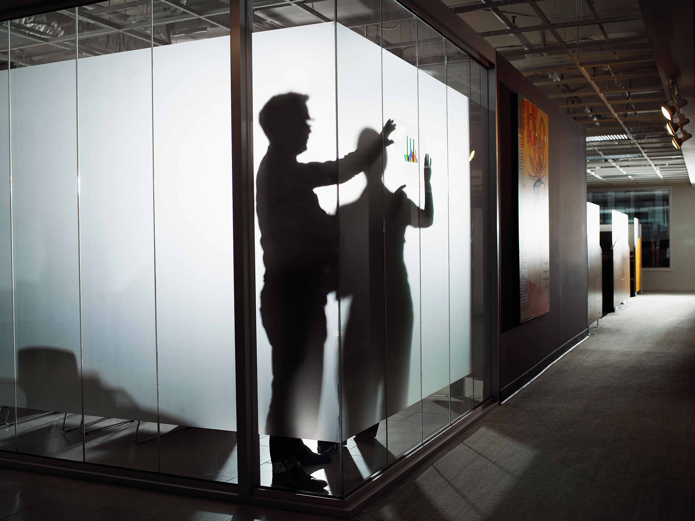 Silhouette of businessman and woman