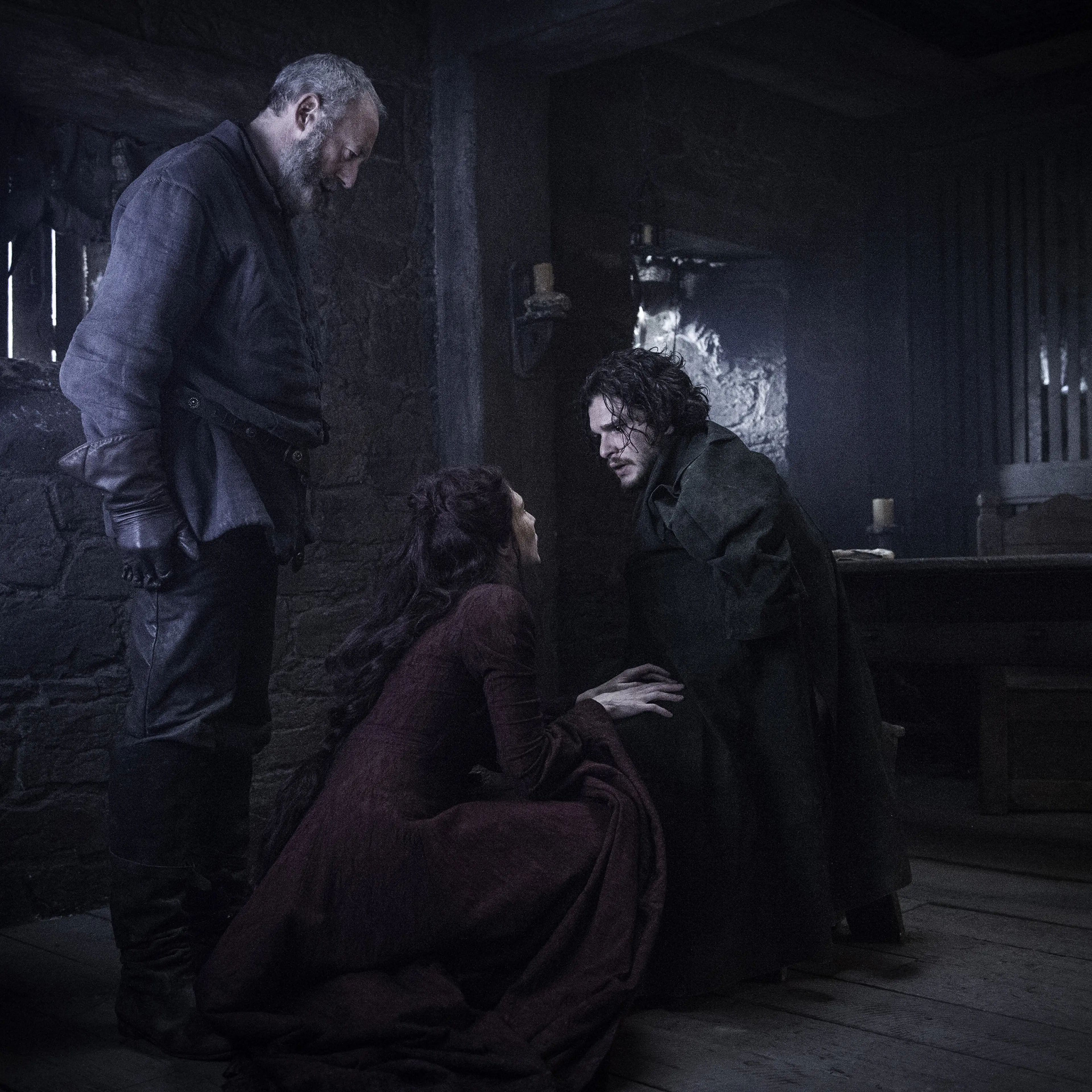 Liam Cunningham as Ser Davos, Carice van Houten as Melisandre and Kit Harington as Jon Snow
