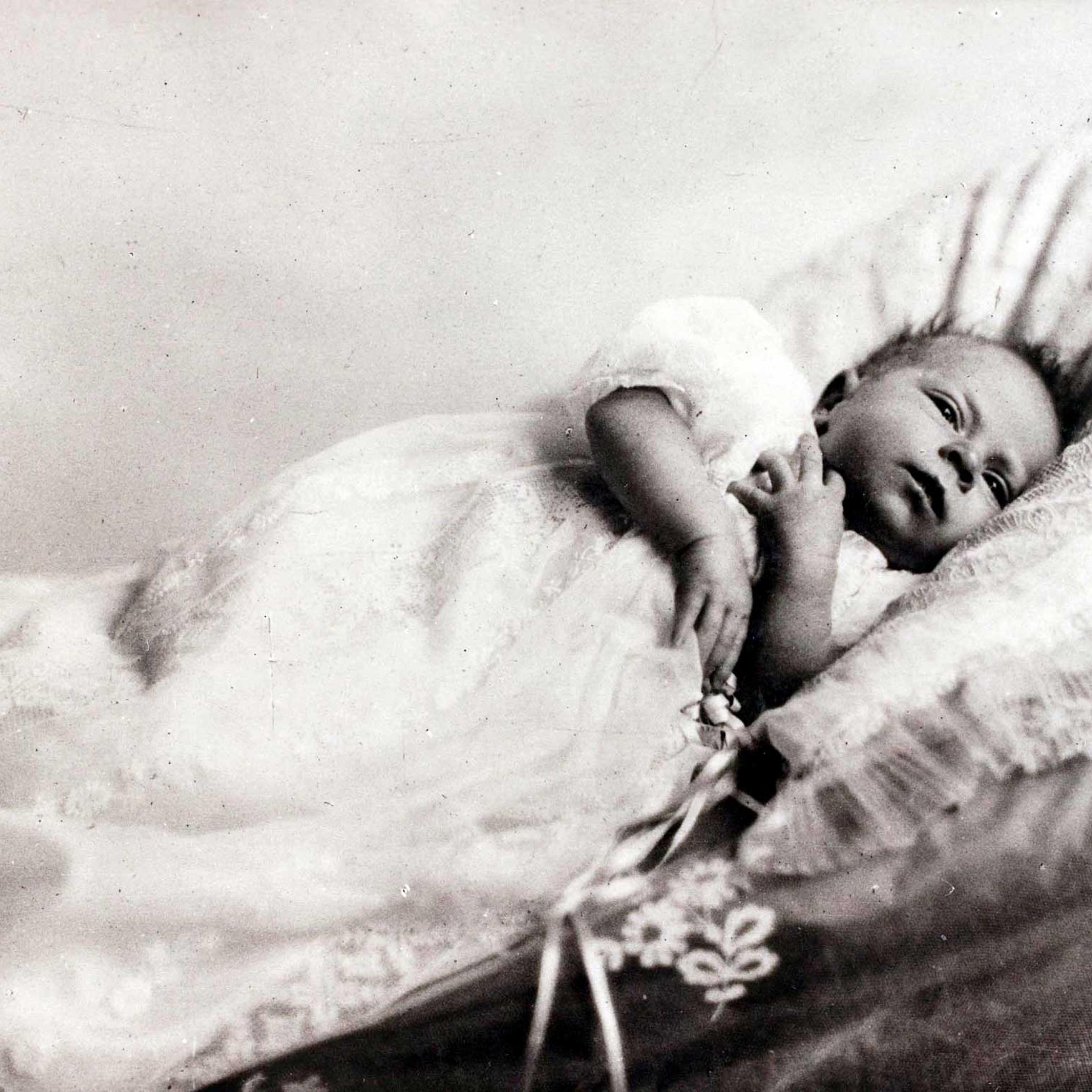 In 1926, as a tiny baby, Princess Elizabeth already displays the solemn face that she has deployed so often in her public duties since becoming Queen.