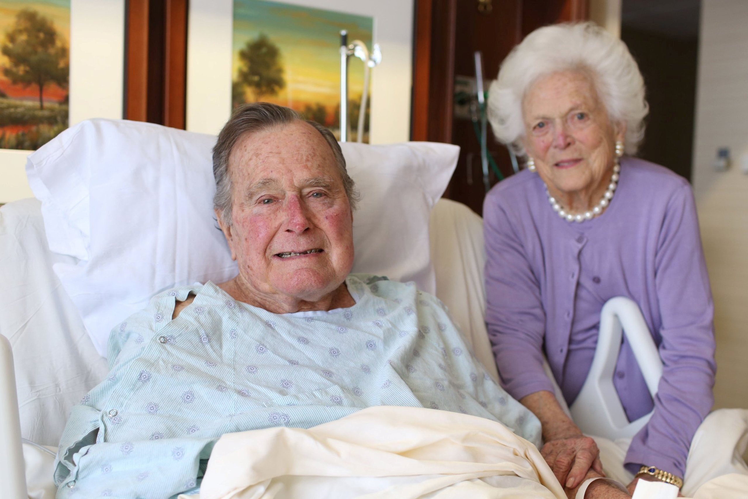 Former President George H.W. Bush and his wife Barbara Bush are pictured in Houston Methodist Hospital in Houston, Texas, U.S. in this January 23, 2017 handout photo. Jim McGrath via Twitter/Handout via REUTERS ATTENTION EDITORS - THIS IMAGE WAS PROVIDED