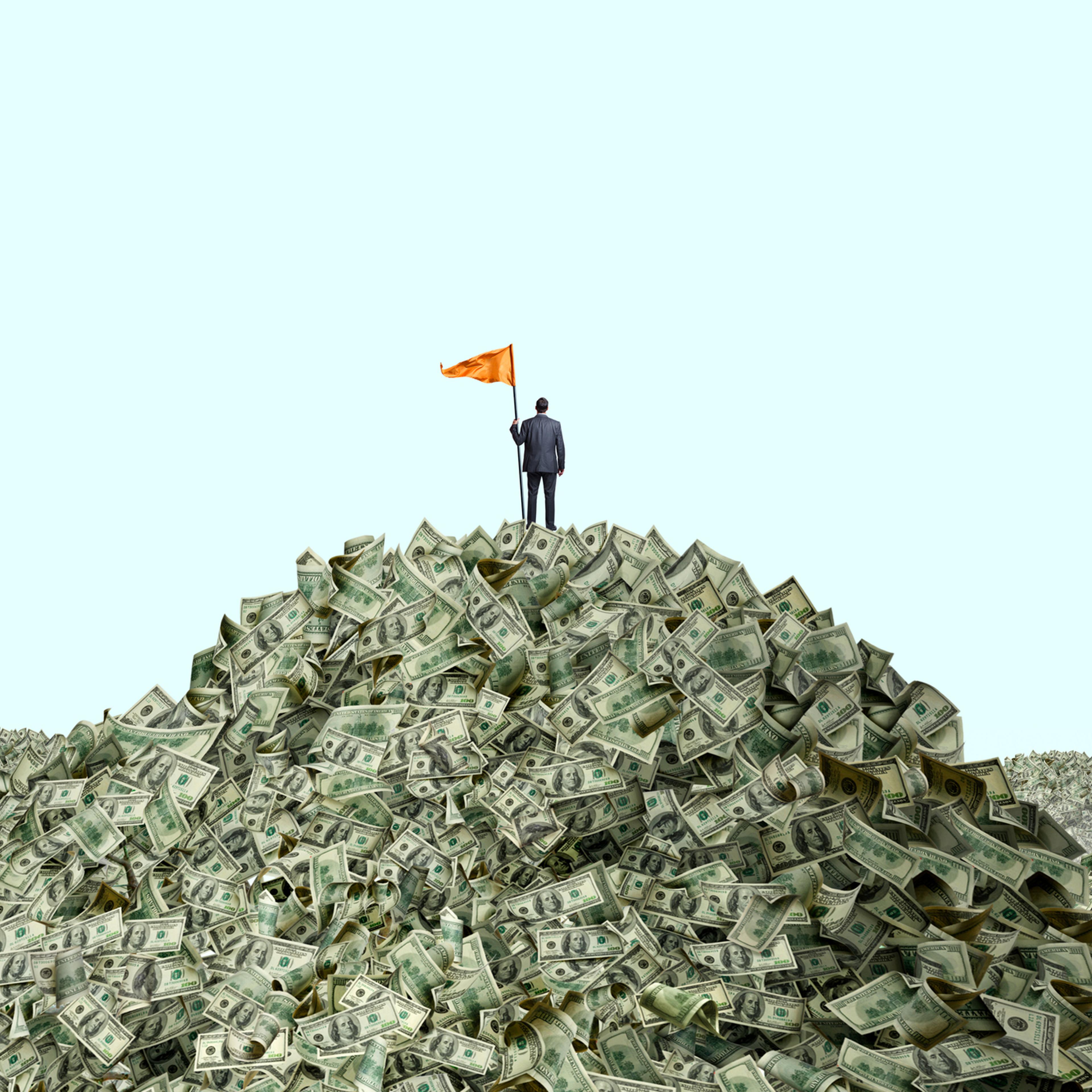 Man Planting Flag On Piles Of Cash