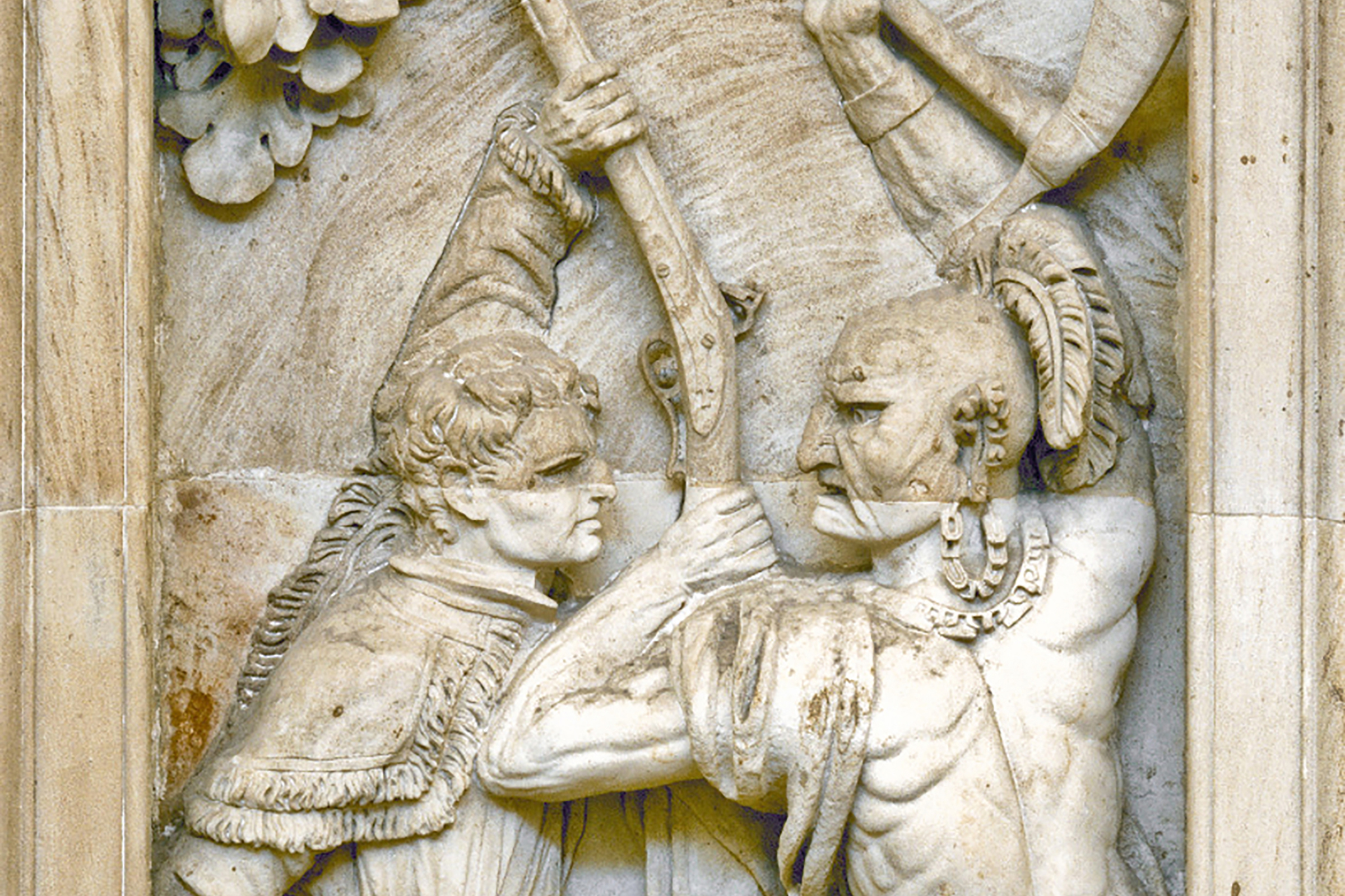 One of these sculptures, carved in 1826-1827 by the Italian artist Enrico Causici, is a gruesome scene showing the explorer Daniel Boone stabbing a Native American warrior.