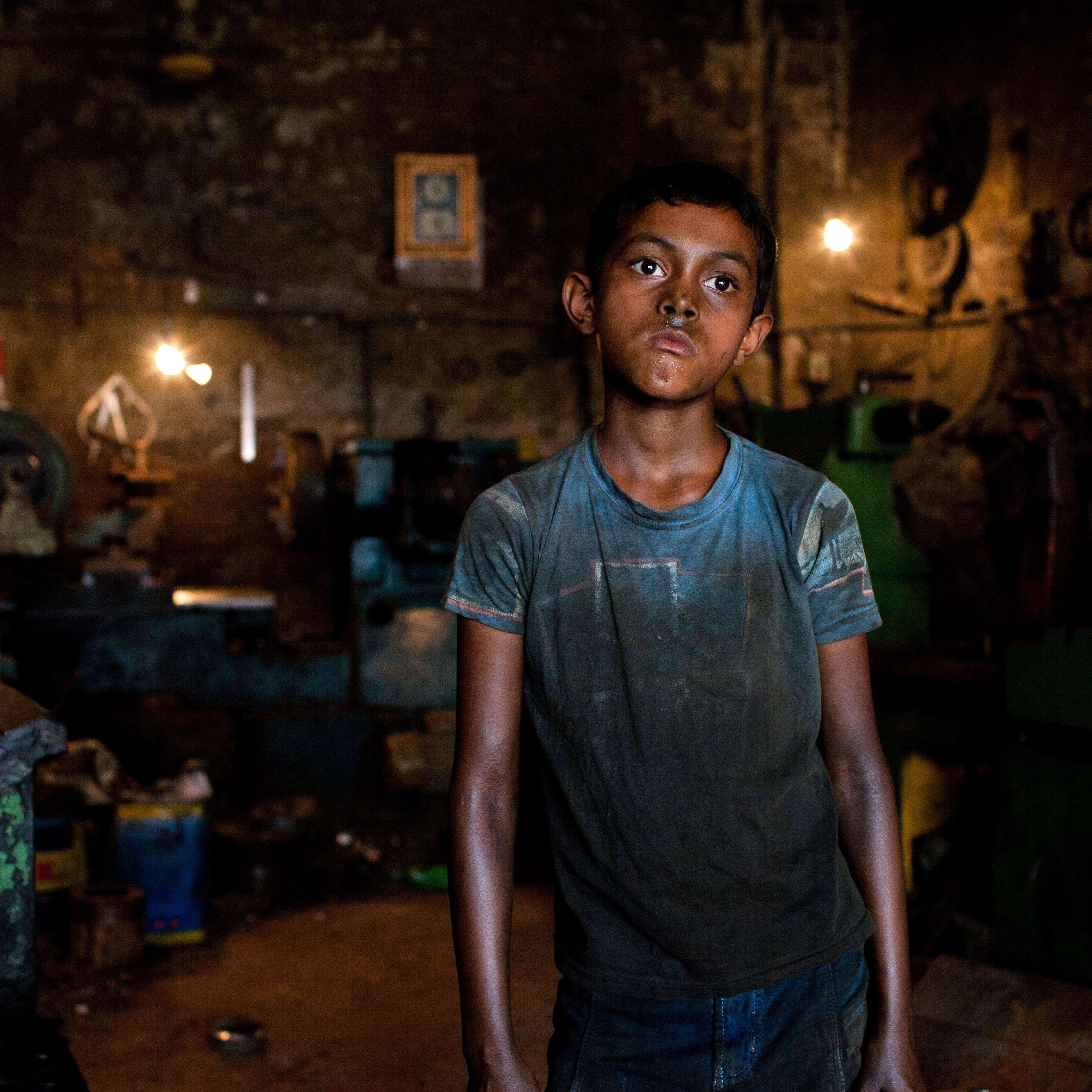 Rakib works in a parts making shop in Dhaka, Bangladesh June