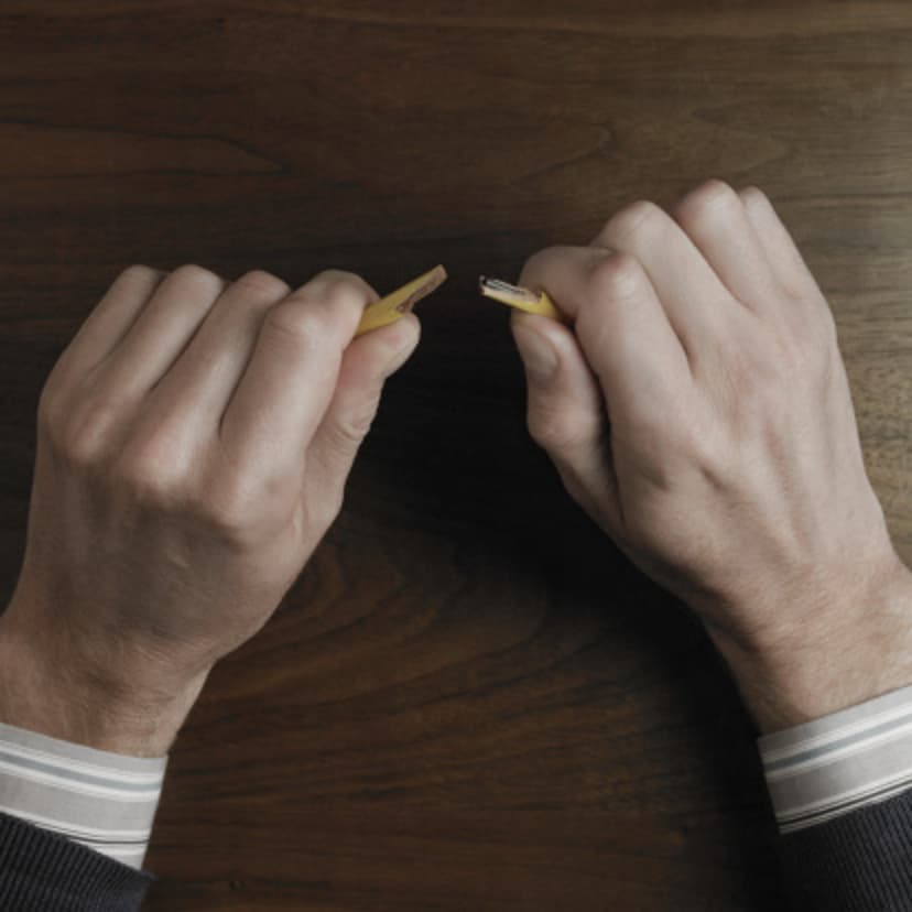 stressed-hands-desk