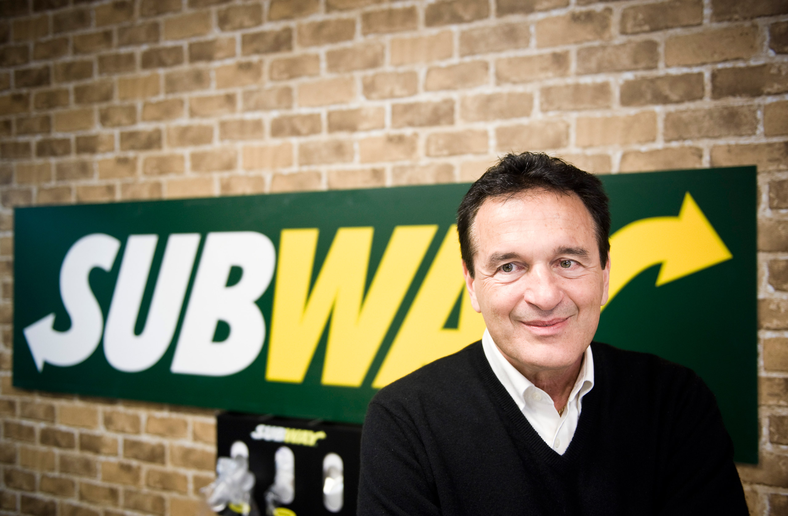 Fred DeLuca, President and founder of sandwich maker Subway, smiles during an interview in a Subway restaurant at "Solna Centrum" in Stockholm on March 10, 2011. The self-made billionaire who heads up sandwich maker Subway, now the world's largest fast f