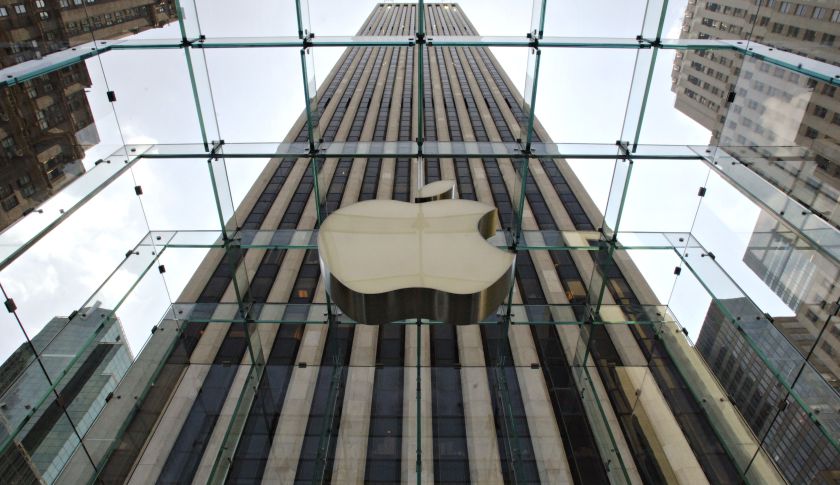 An Apple Computer Inc. logo hangs in the center of a clear g