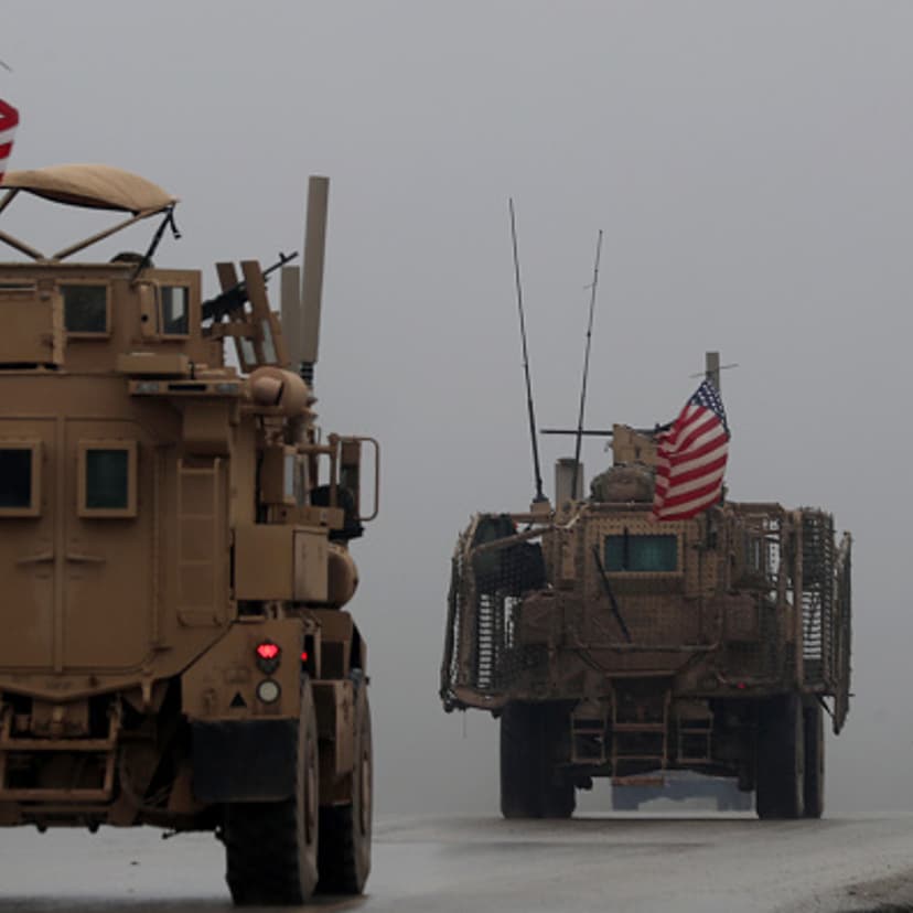 A picture taken on December 30, 2018, shows a line of US military vehicles in Syria's northern city of Manbij. - President Donald Trump announced last week that US troops would depart from Syria, leaving Manbij residents dreading a long-threatened attack