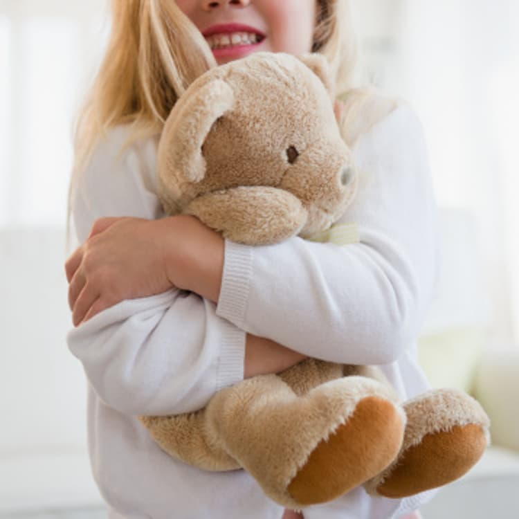 girl-hugging-teddy-bear