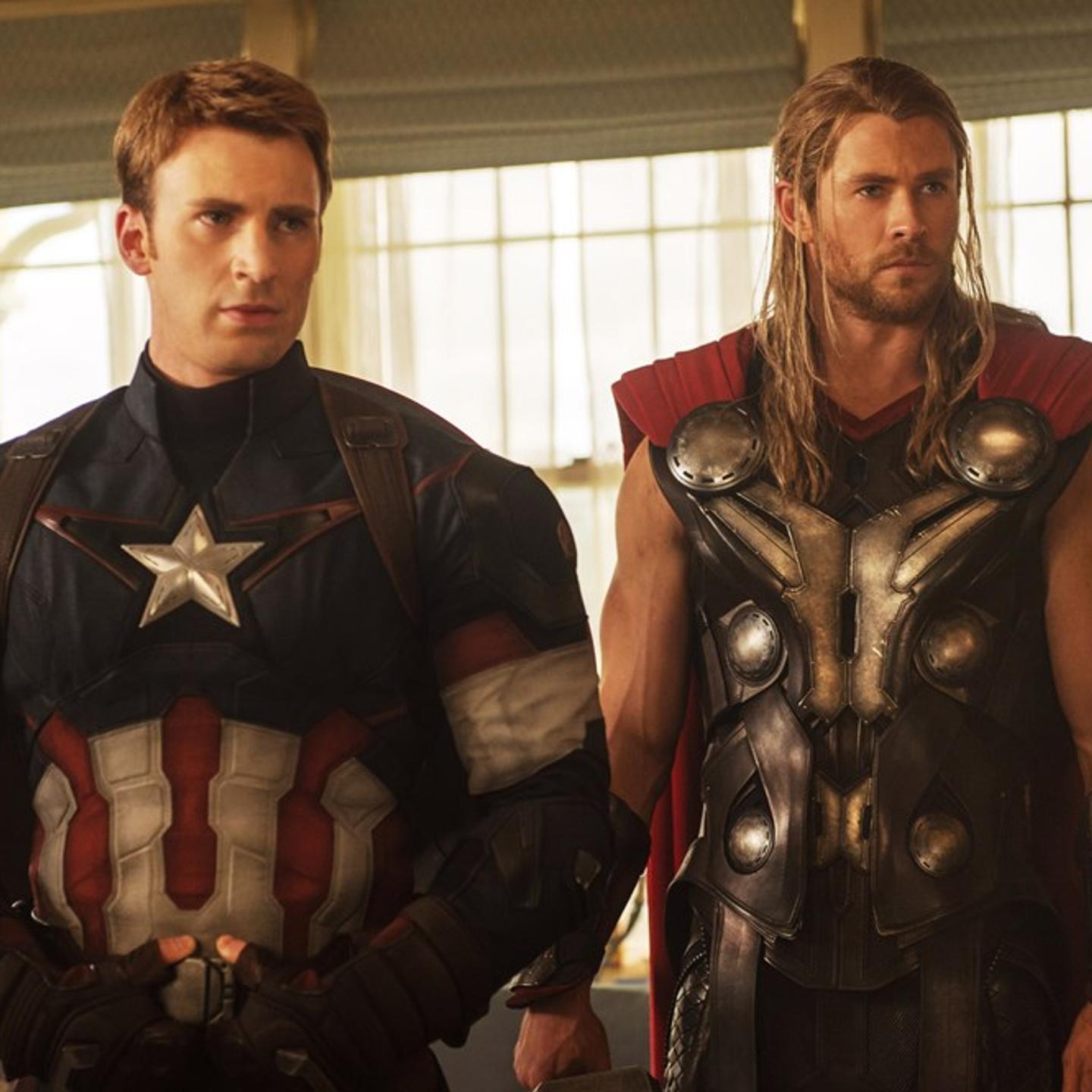 Chris Evans (L) as Captain America and Chris Hemsworth (R) as Thor in AVENGERS: AGE OF ULTRON.