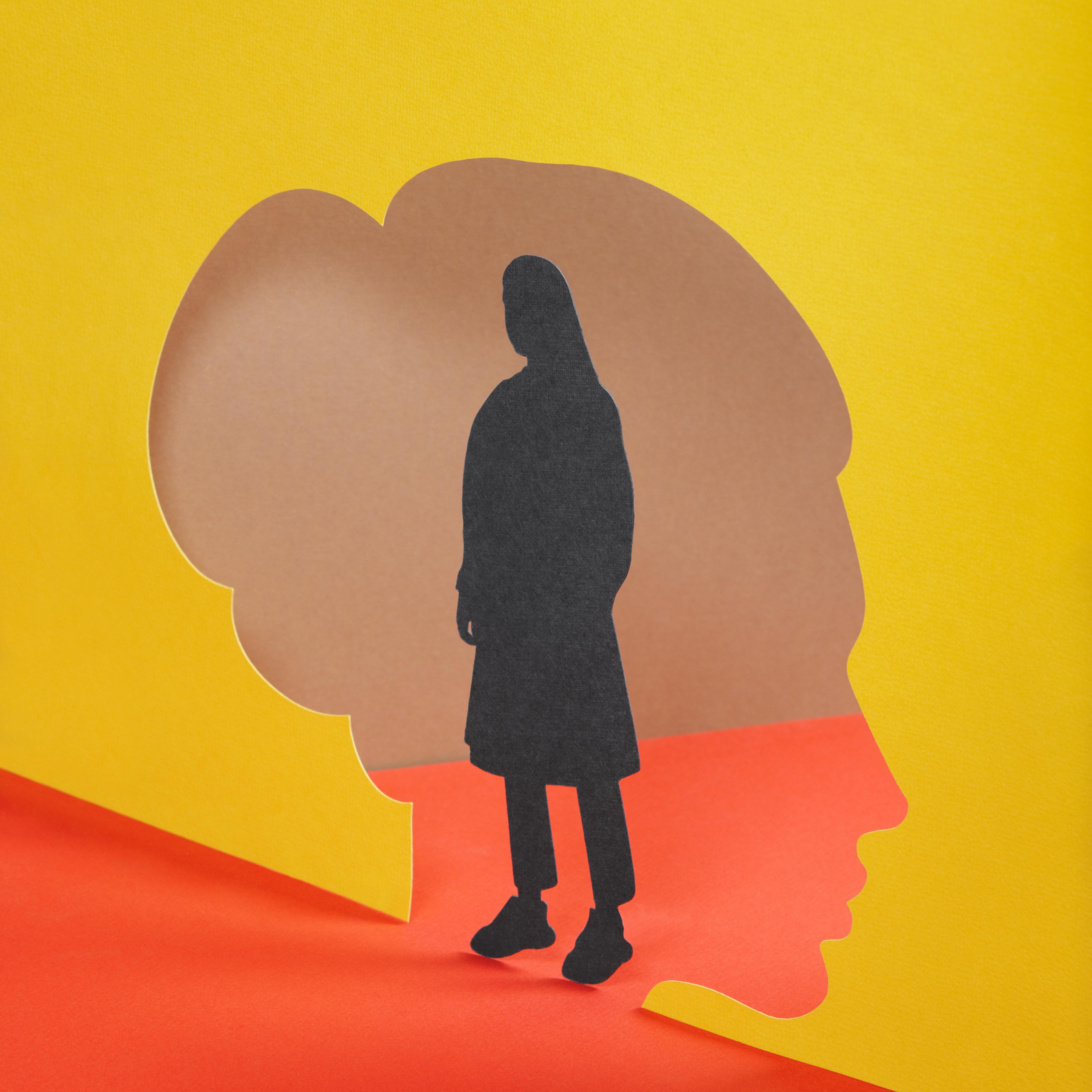 Paper craft illustration of female silhouette