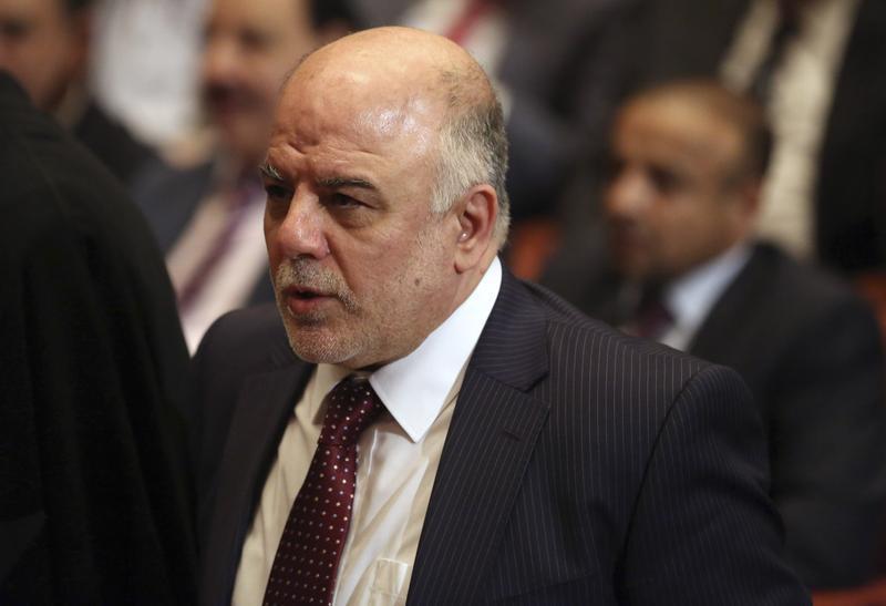 Iraq's new Prime Minister al-Abadi attends the Parliament session to submit his government in Baghdad