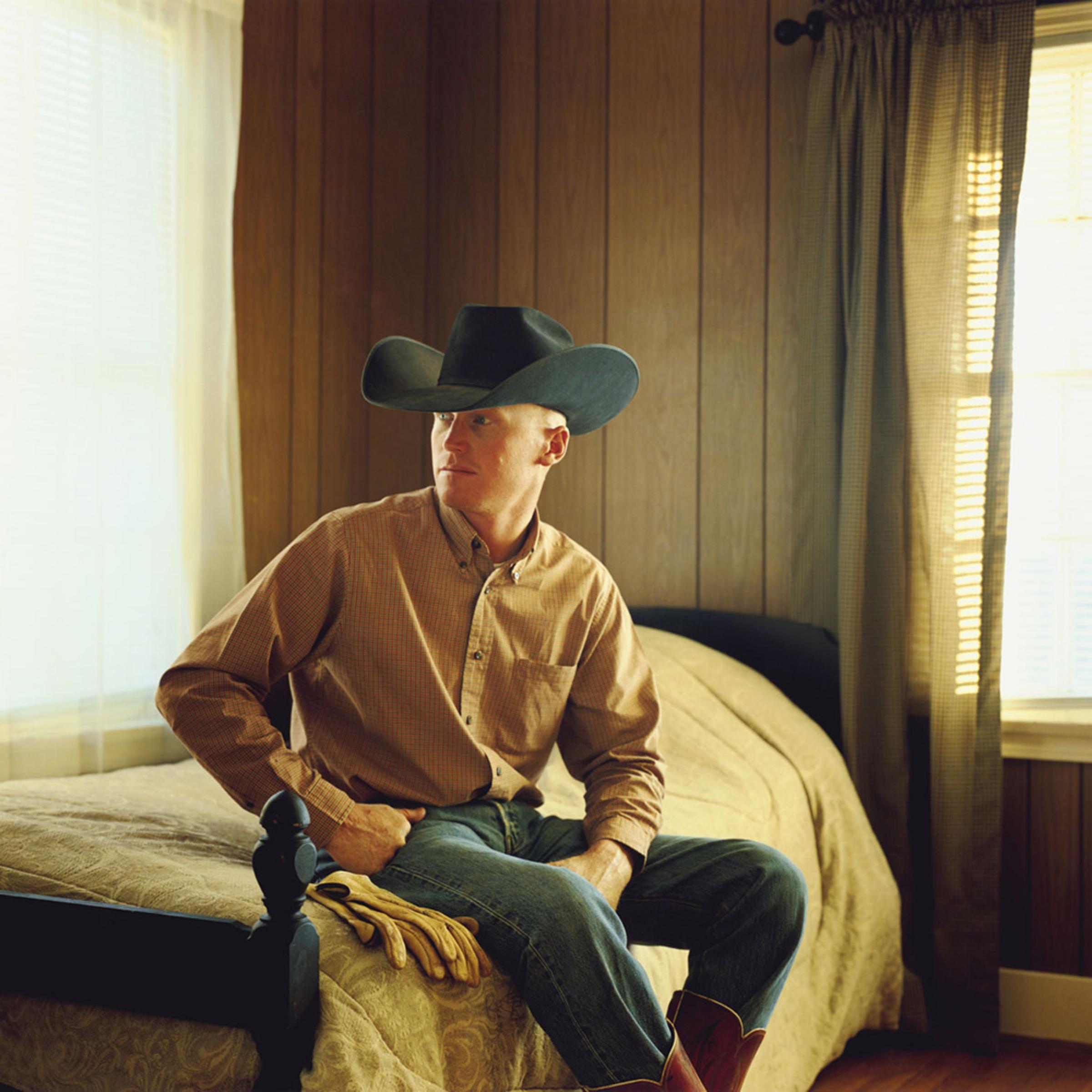 Ron Redford, Cowboy, Benjamin, Texas 2009
<br><br>
Ron stores his leather gloves, which are covered in numbers, around his belt buckle.