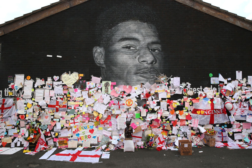 Defaced Mural Of Marcus Rashford Repaired By The Artist In Manchester