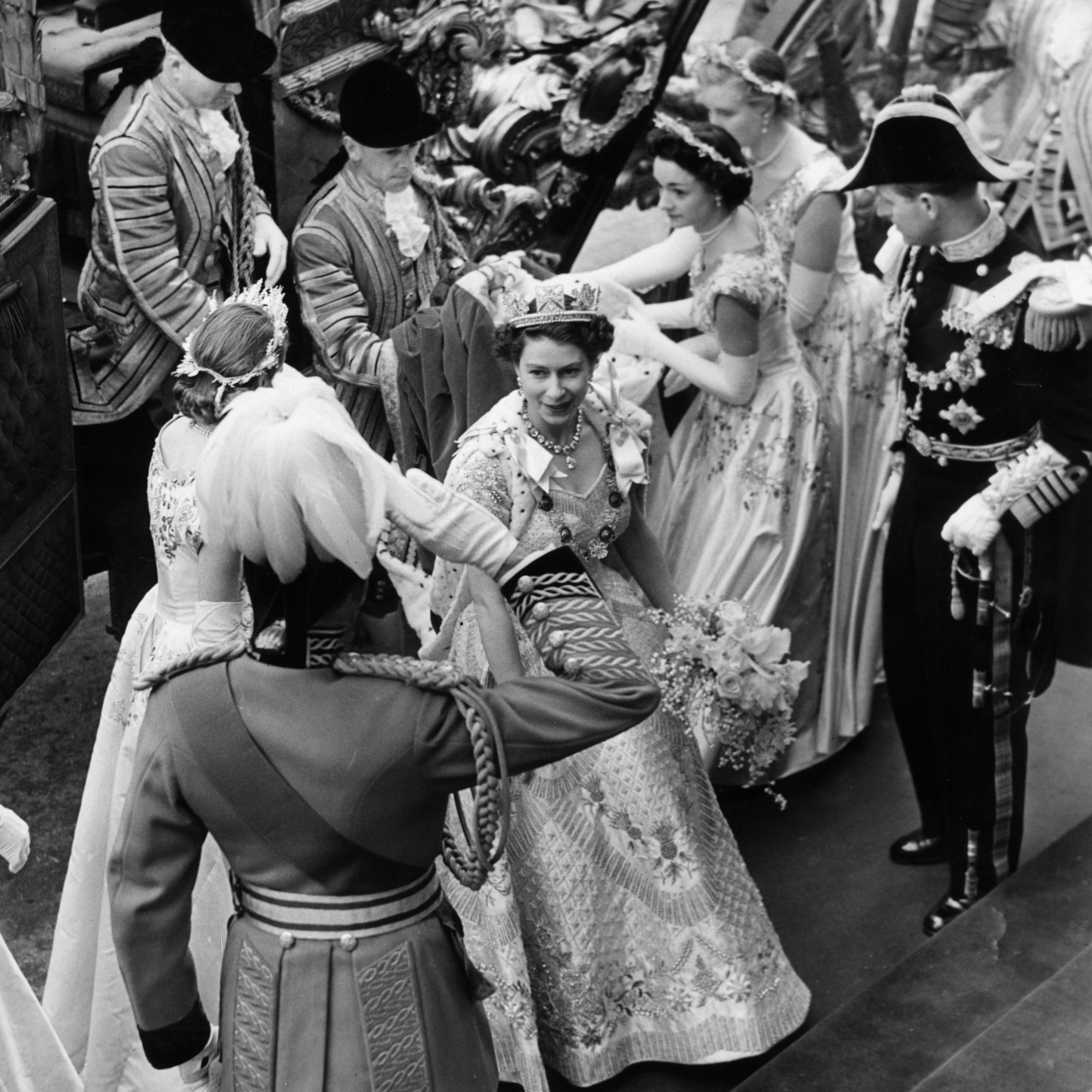 Queen Elizabeth II arrives at Westminster Abbey in the Coronation Coach in 1953.
