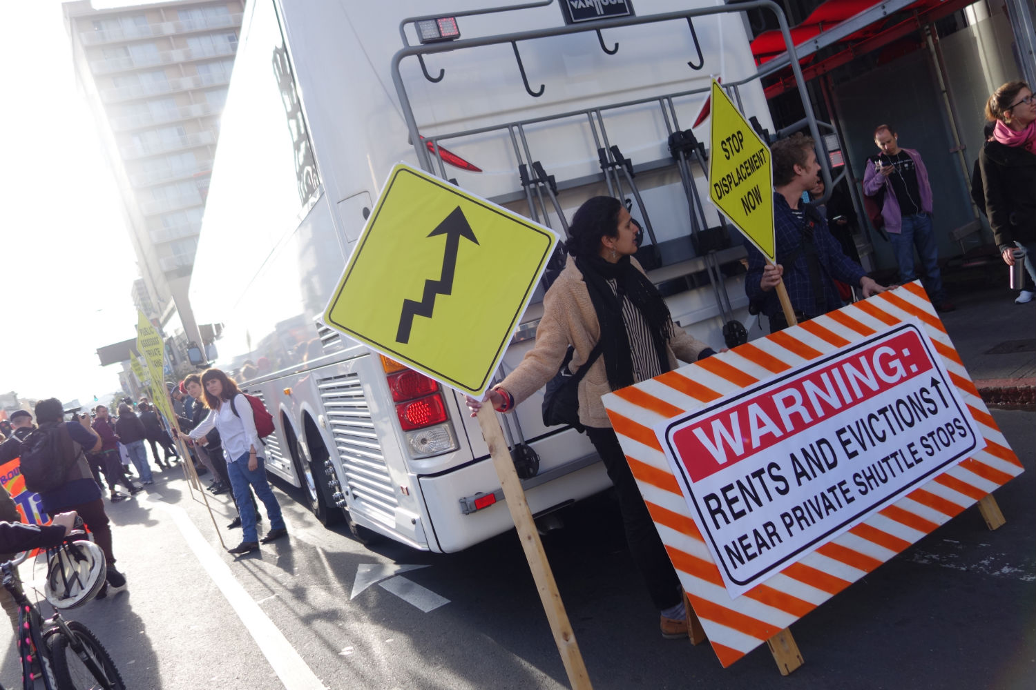 Protestors blockade private shuttle carrying tech industry employees from their homes in San Francisco to their jobs at the company's campus in Silicon Valley.