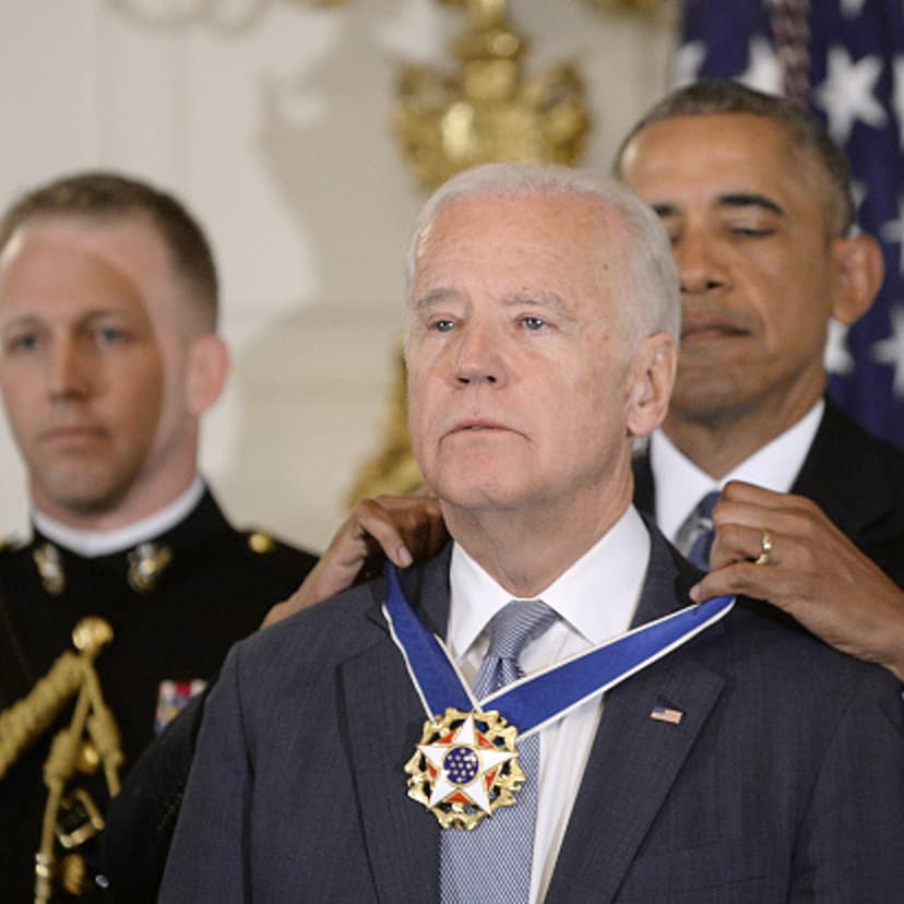 President Barack Obama (R) presents the Medal of Freedom to Vice-President Joe Biden during an event in the State Dining room of the White House, January 12, 2017 in Washington, DC.