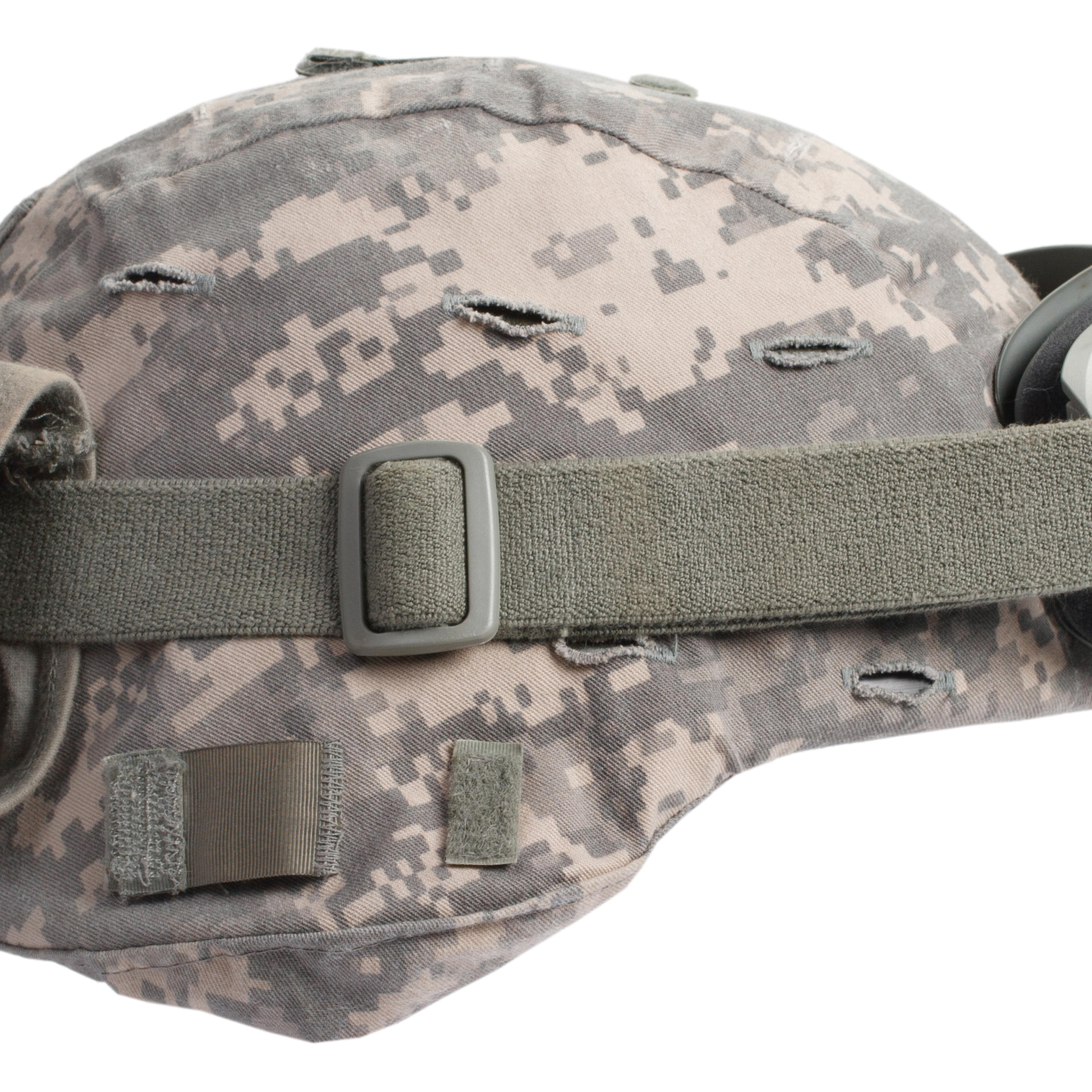 kevlar helmet with camouflage cover and protective goggles