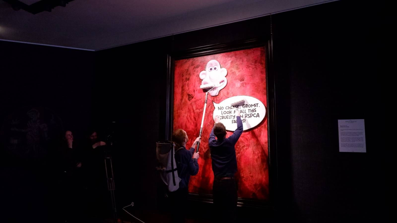 Animal Rising protestors overlay cartoon image on King Charles III's portrait