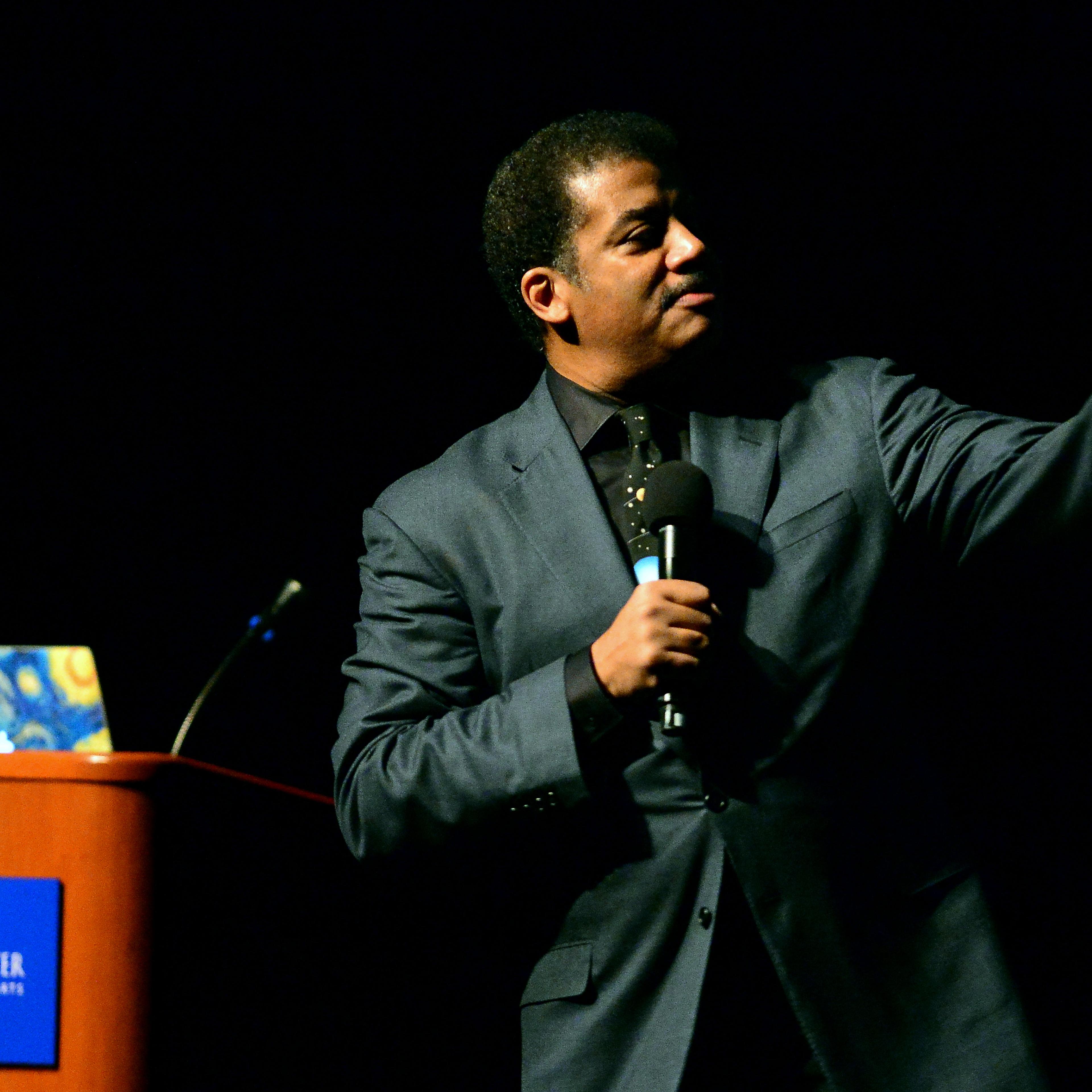 Pointing the way: Tyson at a 2016 talk in Ft. Lauderdale