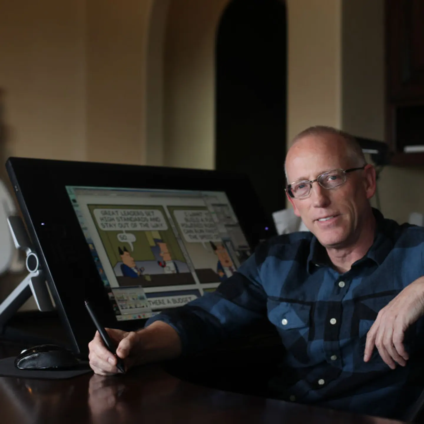 Scott Adams, cartoonist, author and creator of "Dilbert," poses for a portrait in his home office in Pleasanton, Calif. on January 6, 2014.