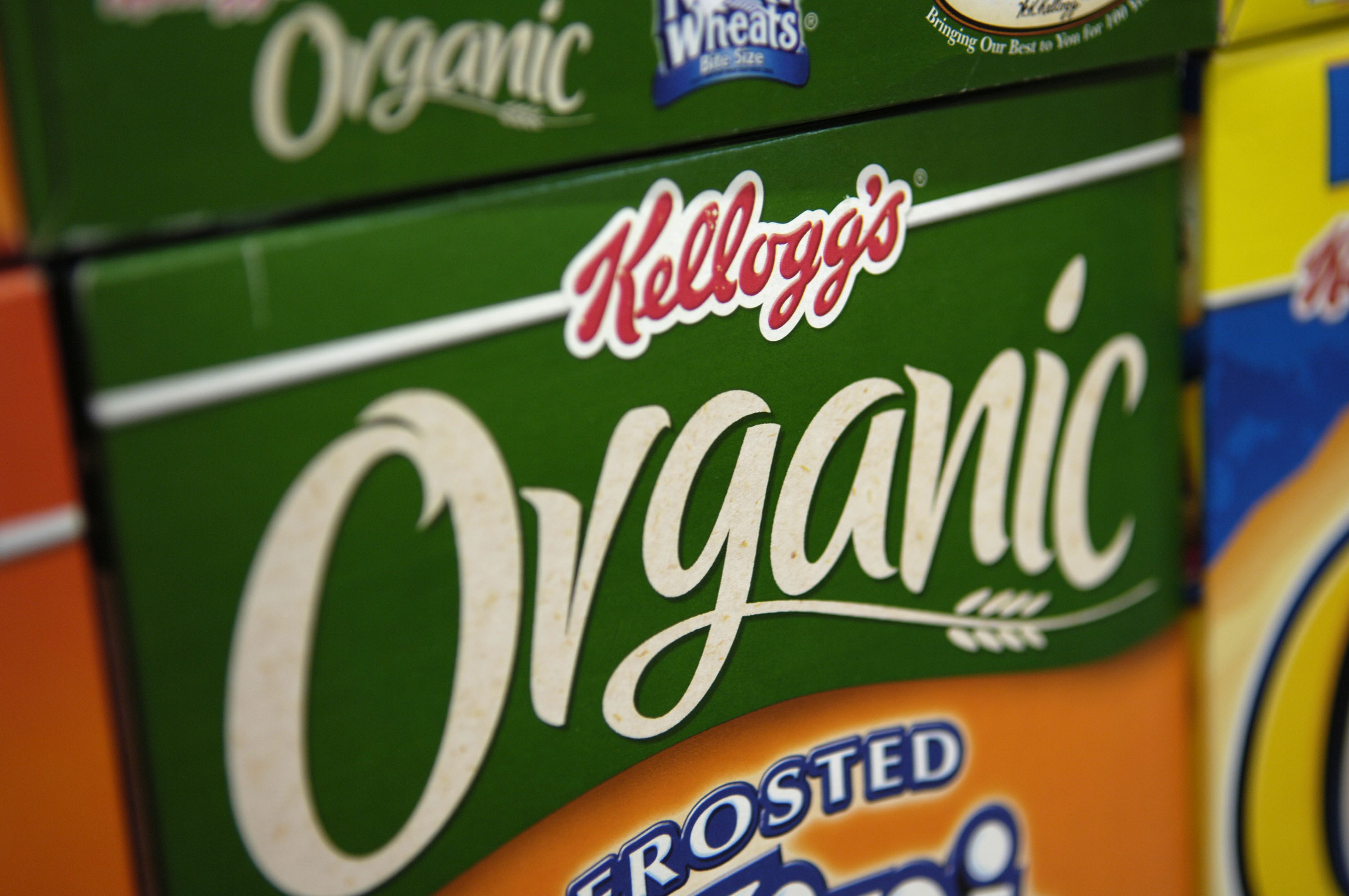 Boxes of Kellogg's Organic Frosted Mini Wheats cereal sit on