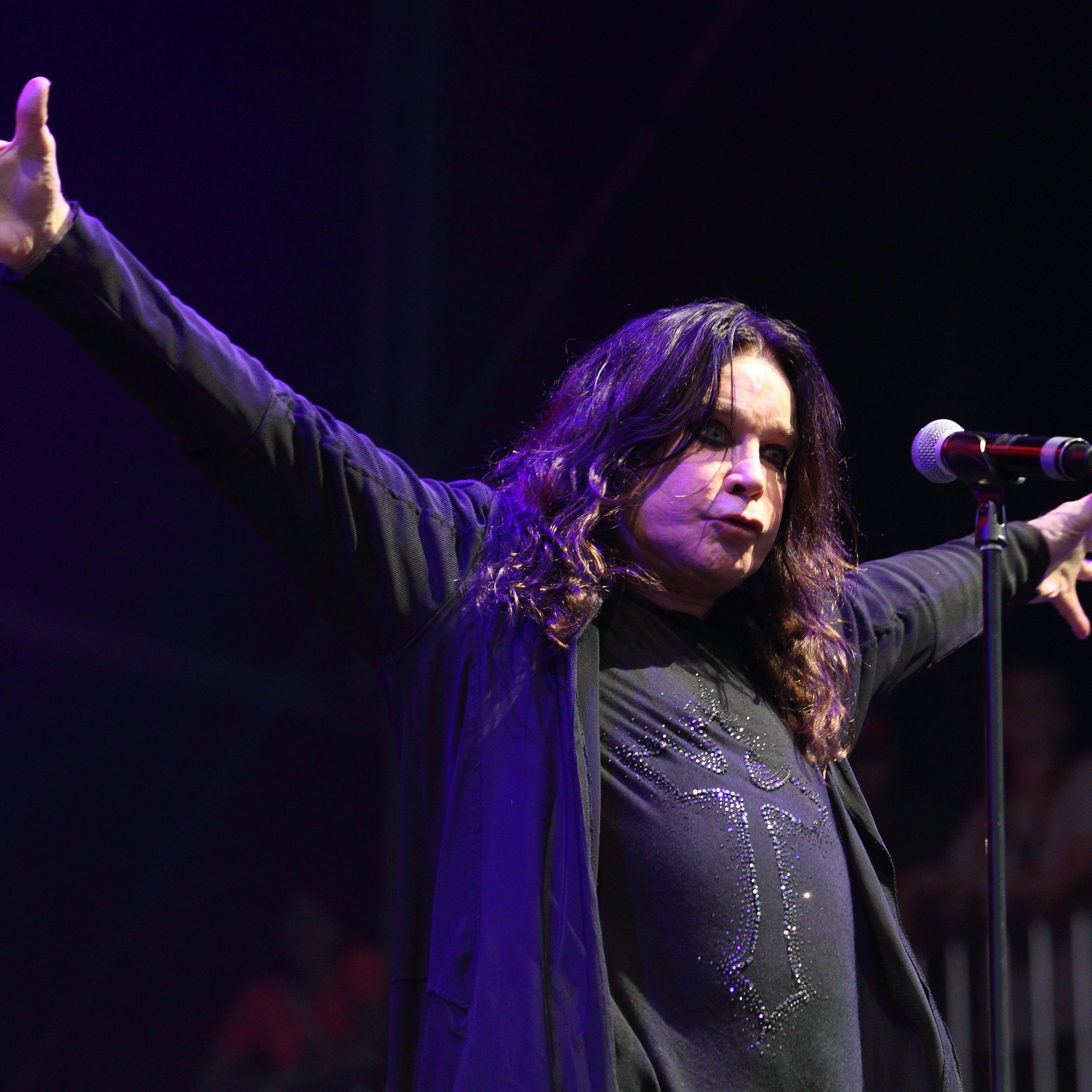 FILE - This Aug. 3, 2012 file photo shows Ozzy Osbourne of Black Sabbath performing at the Lollapalooza festival in Chicago's Grant Park