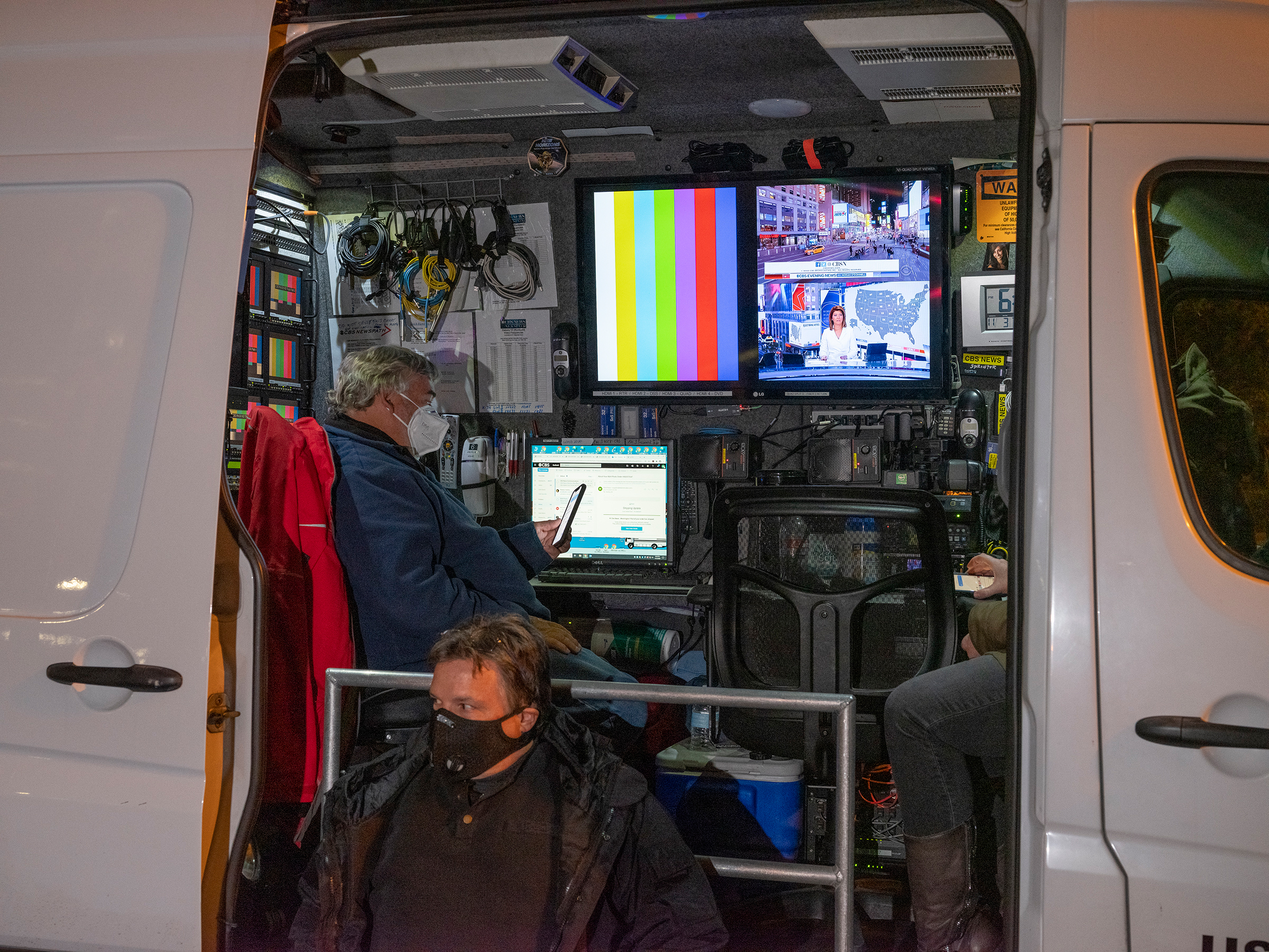 Political news coverage is displayed in a van in Washington, D.C., on Nov. 3, 2020.