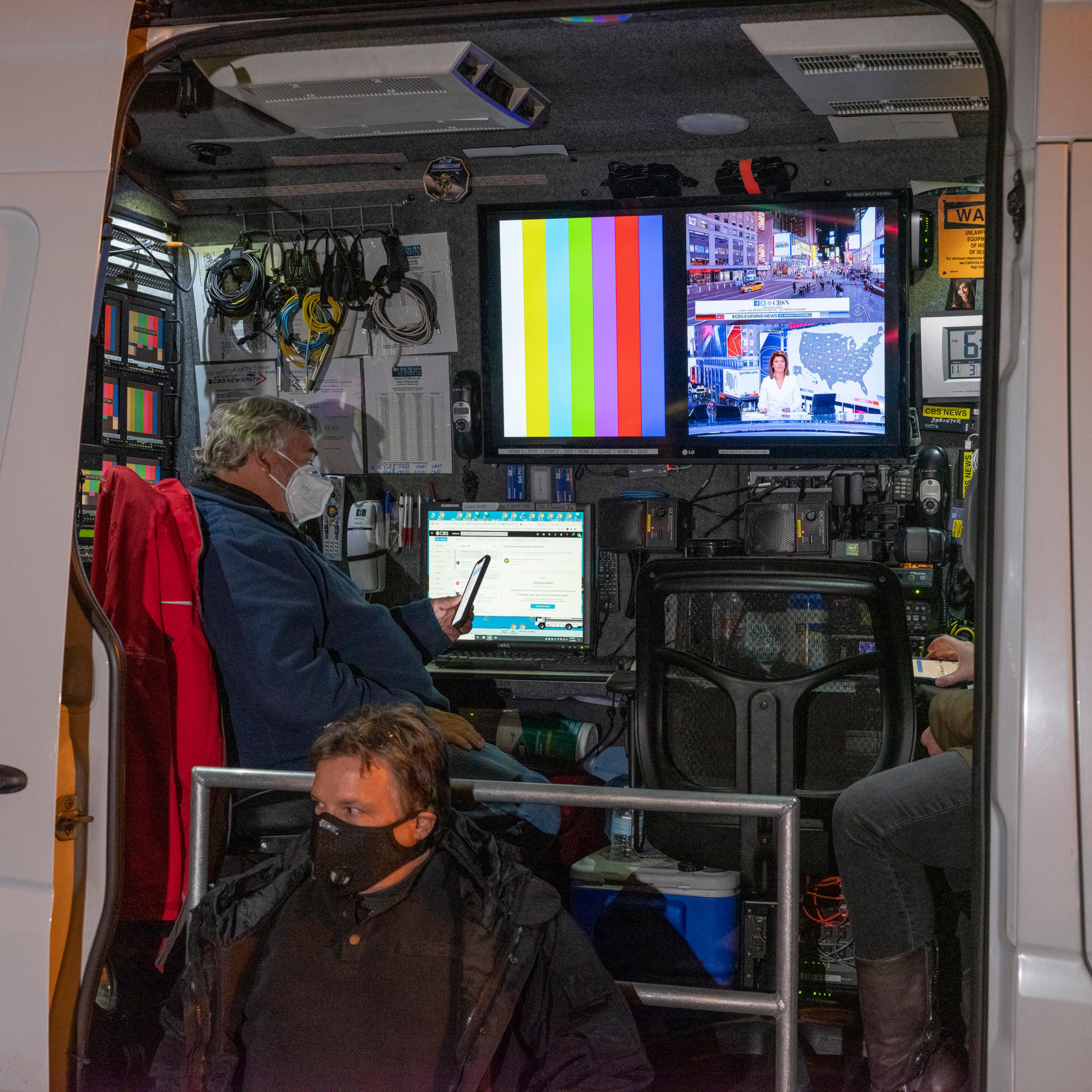 Political news coverage is displayed in a van in Washington, D.C., on Nov. 3, 2020.
