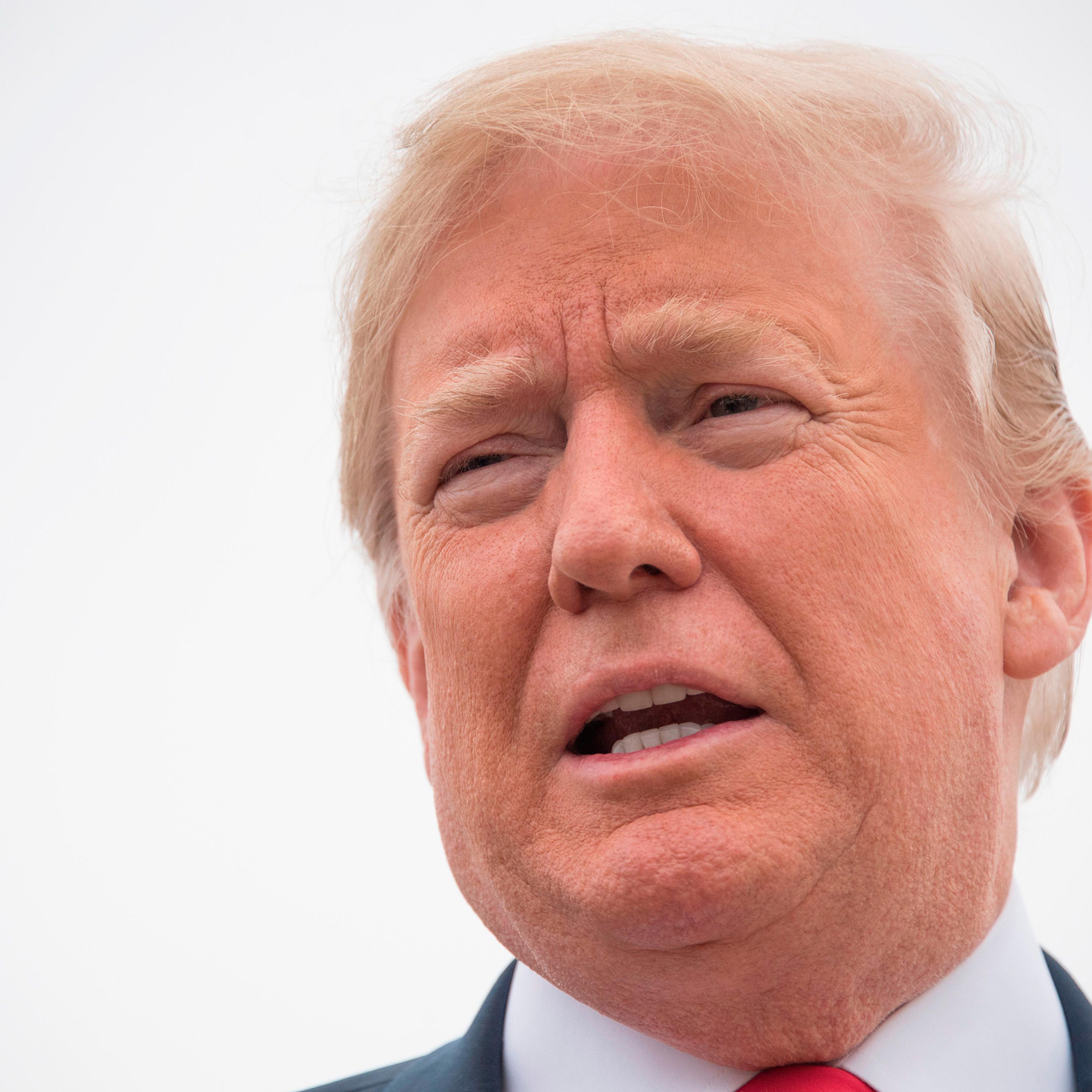 President Donald Trump talks to the press before boarding Air Force One at Andrews Air Force Base, Maryland, on May 31, 2018.