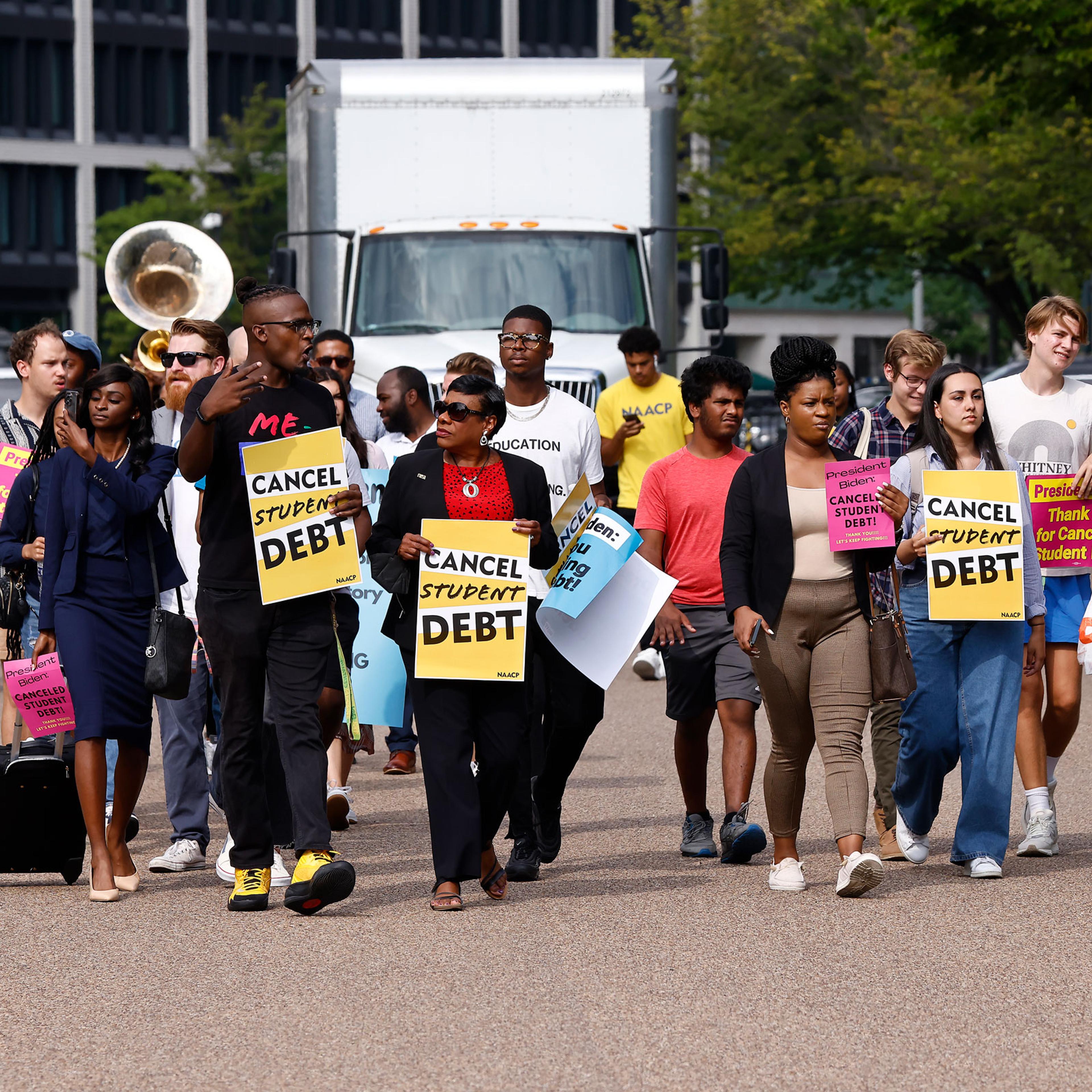 Student loan borrowers stage a rally in front of The White House to celebrate President Biden cancelling student debt