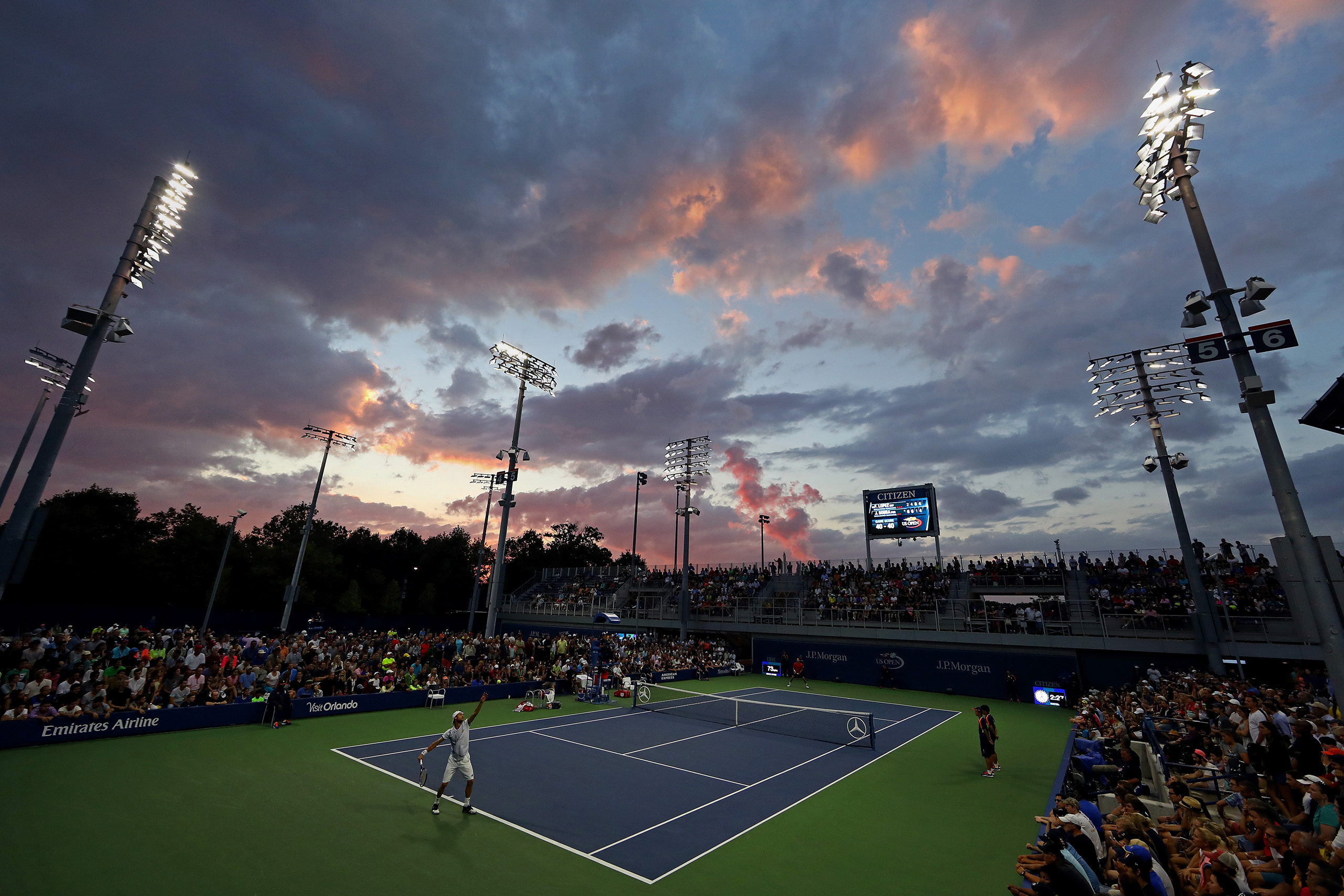 Joao Sousa of Portugal serves to Feliciano Lopez of Spain during his second round Men's Singles match on Day Four of the 2016 US Open at the USTA Billie Jean King National Tennis Center in New York City on Sept. 1, 2016.