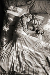 Madje Steber naps with her favorite toy, a stuffed kitty, in her room at Midtown Manor, an assisted living facility, in Hollywood, FL. in 2007. 