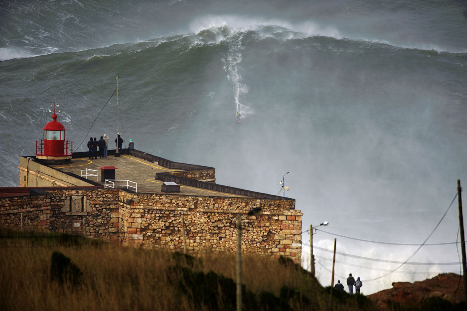 Jan. 28, 2013. U.S. surfer Garrett McNamara rides a wave off Praia do Norte beach in Nazare, Portugal. McNamara is said to have broken his own world record for the largest wave surfed when he caught this wave reported to be around 100ft, off the coast of Nazare. If the claims are verified, it will mean that McNamara, who was born in Pittsfield, Massachusetts but whose family moved to Hawaii's North Shore when he was aged 11, has beaten his previous record, which was also set at Nazare, of 23.77 meters (78 feet) in November 2011.