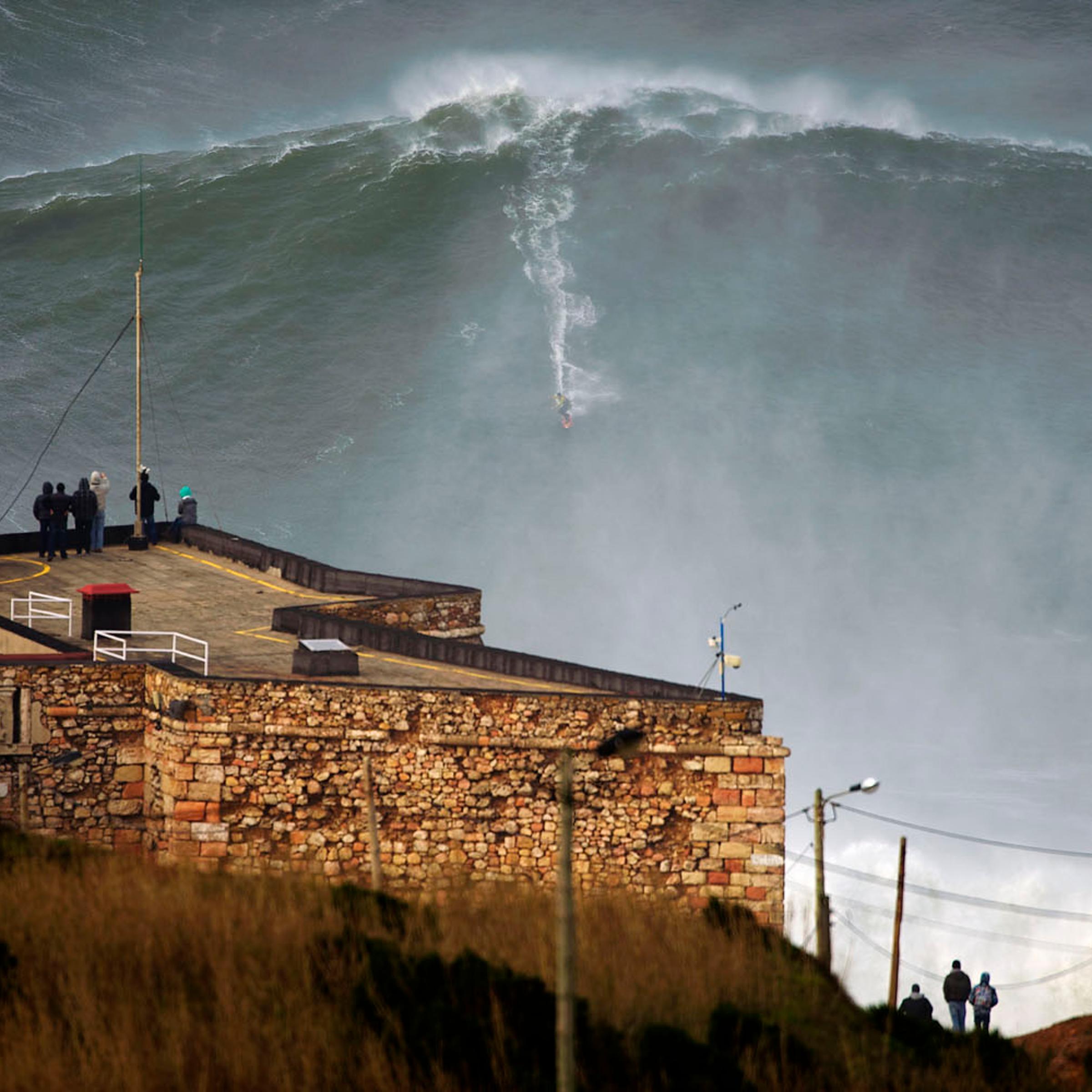Jan. 28, 2013. U.S. surfer Garrett McNamara rides a wave off Praia do Norte beach in Nazare, Portugal. McNamara is said to have broken his own world record for the largest wave surfed when he caught this wave reported to be around 100ft, off the coast of Nazare. If the claims are verified, it will mean that McNamara, who was born in Pittsfield, Massachusetts but whose family moved to Hawaii's North Shore when he was aged 11, has beaten his previous record, which was also set at Nazare, of 23.77 meters (78 feet) in November 2011.