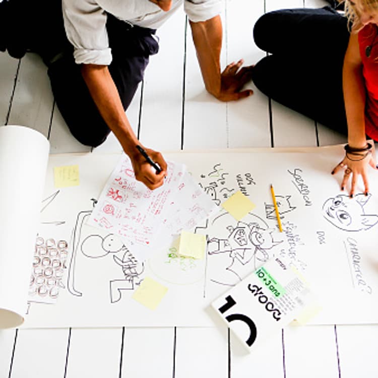 colleagues-brainstorming-floor