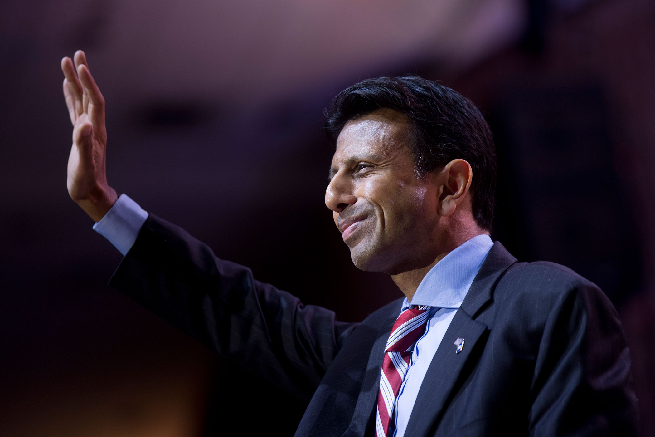 Bobby Jindal, governor of Louisiana, waves after speaking during the Conservative Political Action Conference in National Harbor, Maryland, U.S., on Thursday, March 6, 2014.
