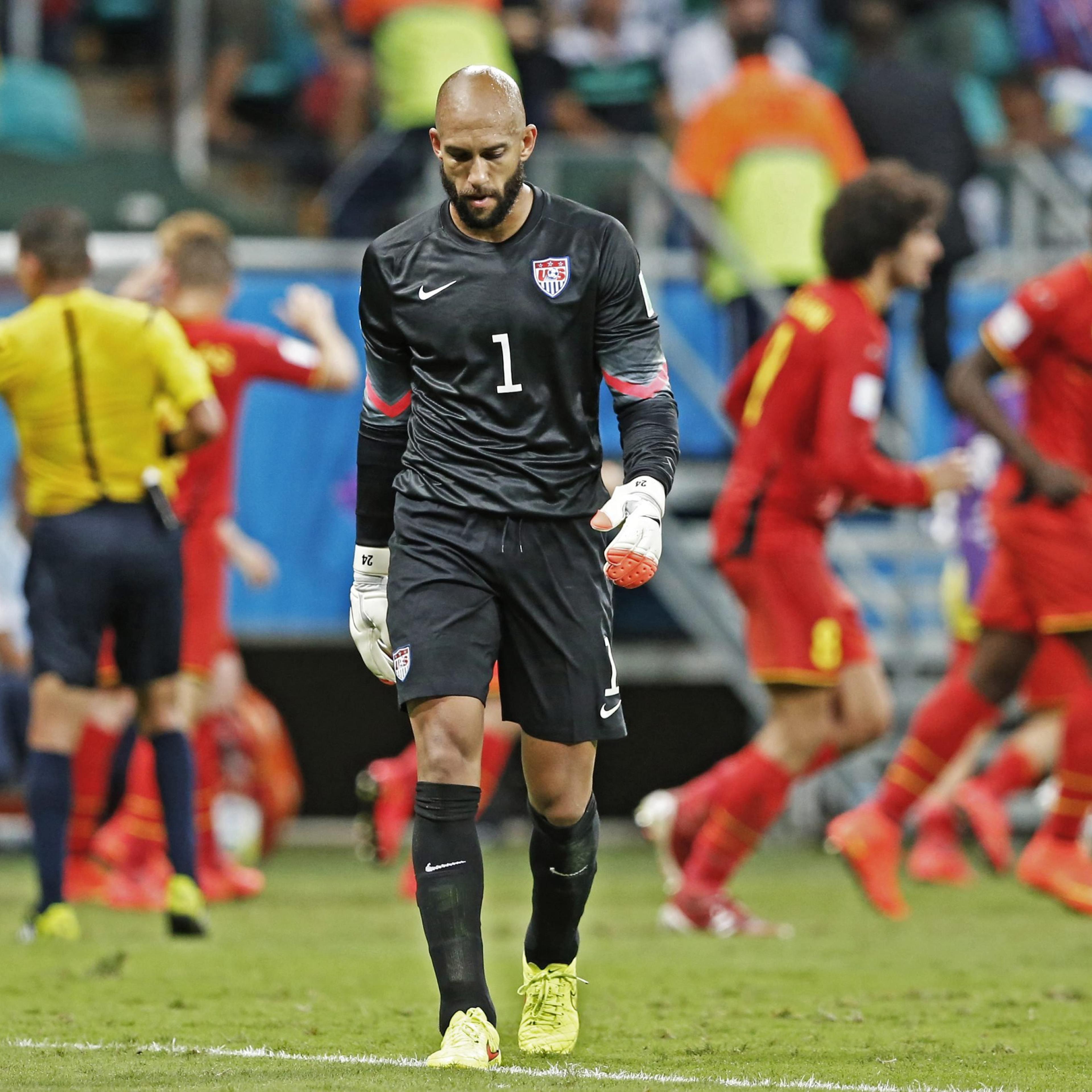 USA's goalkeeper Tim Howard reacts as Belgium's players celebrate their goal during the FIFA World Cup 2014 round of 16 match between Belgium and the USA at the Arena Fonte Nova in Salvador, Brazil on July 1, 2014.