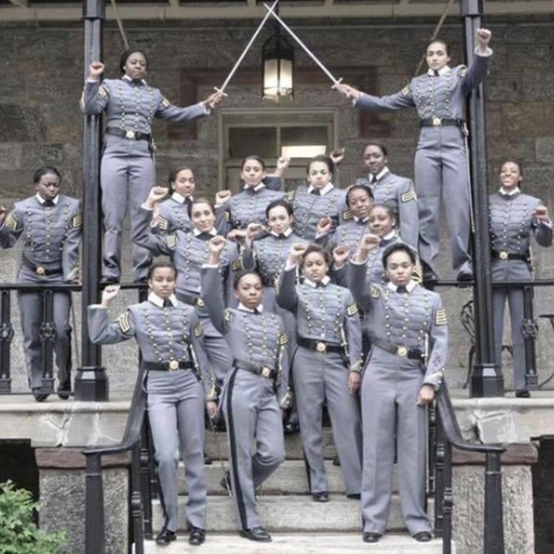 This undated image obtained from Twitter on Saturday, May 7, 2016 shows 16 black, female cadets in uniform with their fists raised while posing for a photograph at the United States Military Academy at West Point, N.Y.